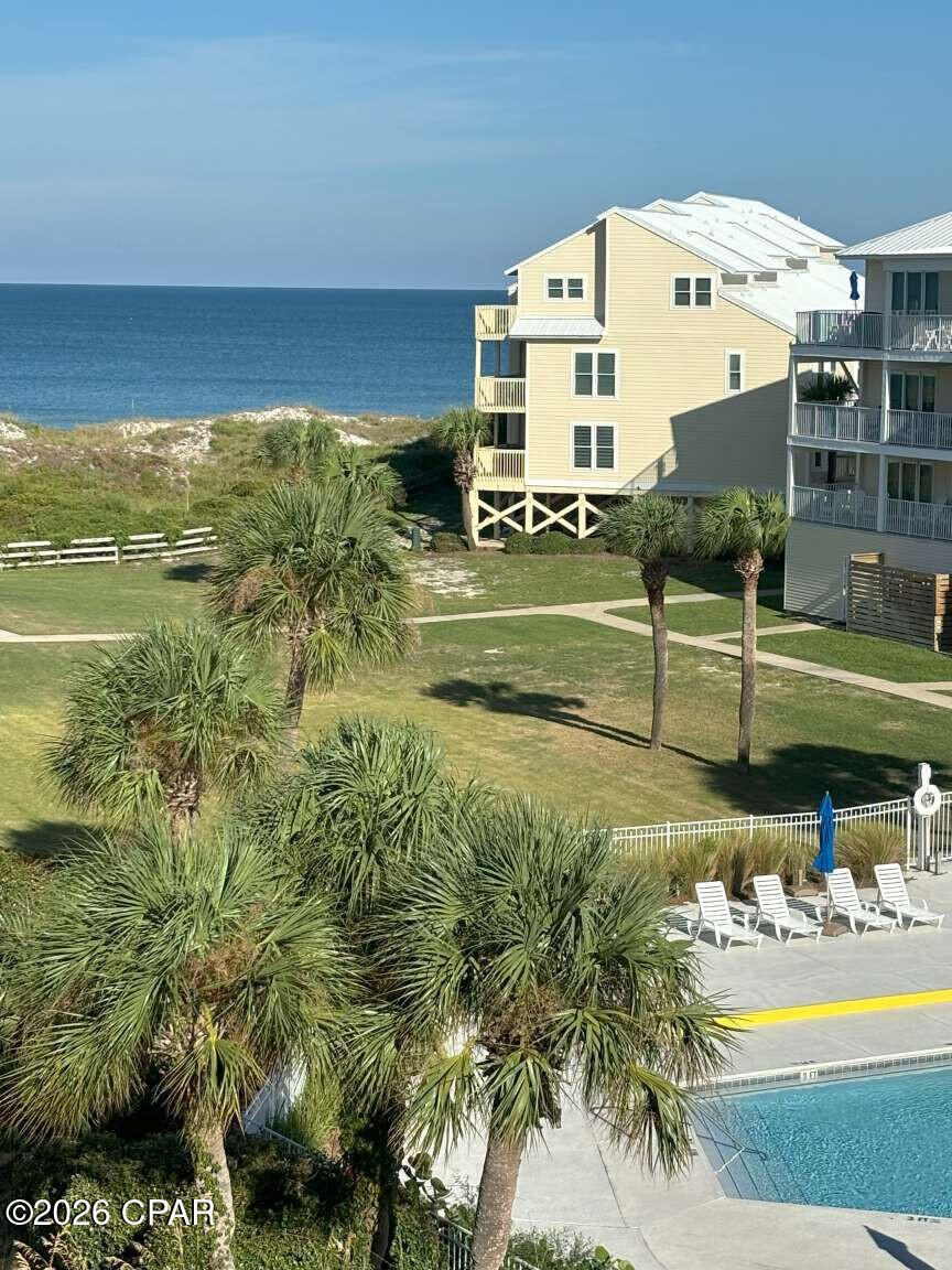 Brand NEW 4br 4.5bath Townhome - ready to move in. Great Gulf view. Fully Furnished - ready to use today. Gated community. Pool. Upgrades everywhere. Elevator, granite tops, premium decking, impact windows, spray foam insulation, metal roofing, Vaulted upper floor, covered decks on 3 levels, 2 water heaters, 3 ac units for comfort and low bills. 3 showers have custom tile and glass doors. Bunk room with 4 bunks with XL twin beds. This is the best Place on the Cape. Park under the unit in the shade. Fiber internet, Electronic door locks, Cameras. water filtration installed. Fire sprinklers included.