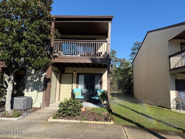 Welcome to Portside Resort on the desirable west end of Panama City Beach, This two-story, two and a half bath condo offers a spacious layout with the privacy of a townhome and all the conveniences of a beachside community. The open main living area features comfortable gathering space, a well-appointed kitchen, and access to a private patio--perfect for relaxing after a day on the beach. Upstairs you'll find generously sized bedrooms providing peaceful retreats for family and guests. Portside Resort is known for its beautifully maintained grounds and excellent amenities including multiple swimming pools, tennis courts, clubhouse, and easy beach access just across the street. Whether you're looking for a primary residence, vacation getaway, or income-producing short term rental.