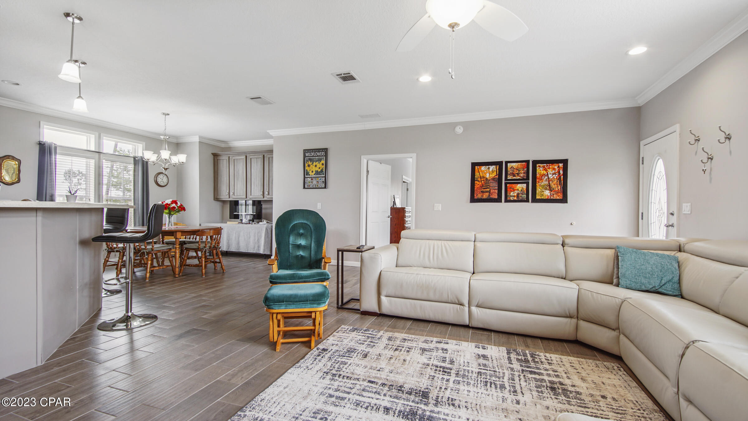 How do you begin to explain the finest, most well built Mobile Home I have ever seen in 35 plus years? This home and I do mean home is the top of the line Jacobsen Homes with $50,000.00 in document upgrades. The new home was built in 2018 and was a $100,000.00 home BEFORE upgrades.The upgrade list is entirely too long to put in this area so the original order form is listed in the documents section of the listing  page.  This home looks like and built like new homes in the area. Stem wall concrete block foundation with tie down steel rods around perimeter of the home from truss to base.  All custom built heavy duty flashing to protect so NO water intrusion around home base.  Hurricane shutters on all Windows. The home sits on 1.88 acres that allows for 4 homes to be built with no changes. The home comes completely furnished minus master bedroom  furniture. $8,000.00 in appliances to include top of the line Samsung top load washer and dryer. #6,000.00 living room set. $5,000.00 Large safe in the home stays with the sale.