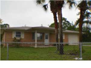 Nice move in ready home on quiet corner in Sunny Hills. Property is chain-link fenced completely. Brick ranch style home with living room open to dining area. master bedroom has private bath and large walkin closet. Second bedroom with carpet close to additional bathroom. Small additional room could be used as office. large Den on back of home (has been used as 3rd bedroom) open to spacious screened porch. This one wont last long!!!!