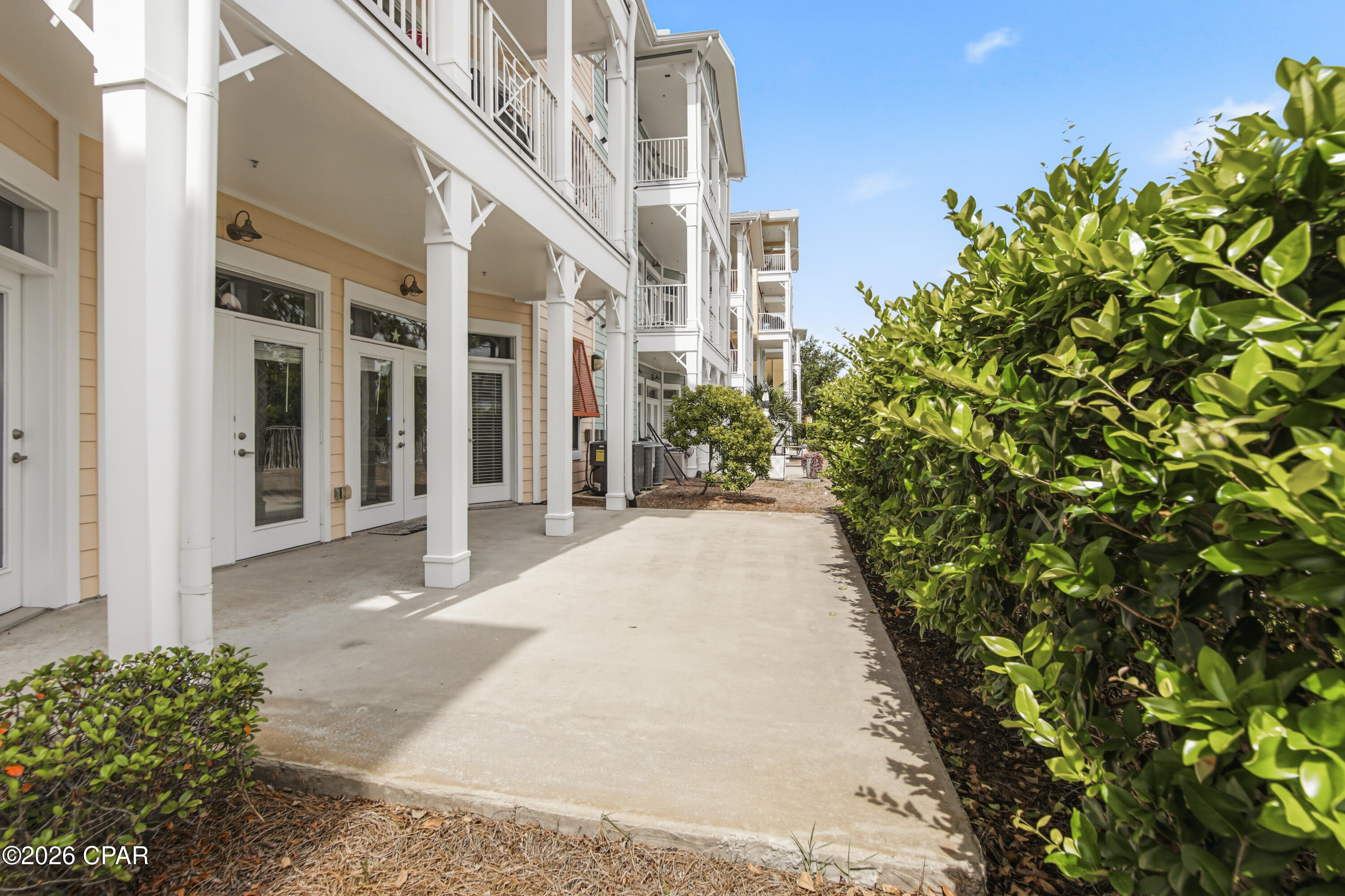 This beautiful  Island Reserve ground floor unit has so many wonderful features such as an open floor plan, 2 master suites, high ceilings  & granite countertops.One of the few units with convenient covered parking connecting to the building. The Resort of Island Reserve is remarkable! This Gated community has wonderful amenities including a gorgeous one acre, resort style lagoon pool with rock waterfall, state of the art fitness facility, billiard & game room, Media Center with 100'' Theater Scree & an indoor pickle ballcourt, The Parking garage has Direct Access to each floor. This is a brilliant location close to shopping  and only 1.4 miles to the beautiful gulf and sandy white beaches.