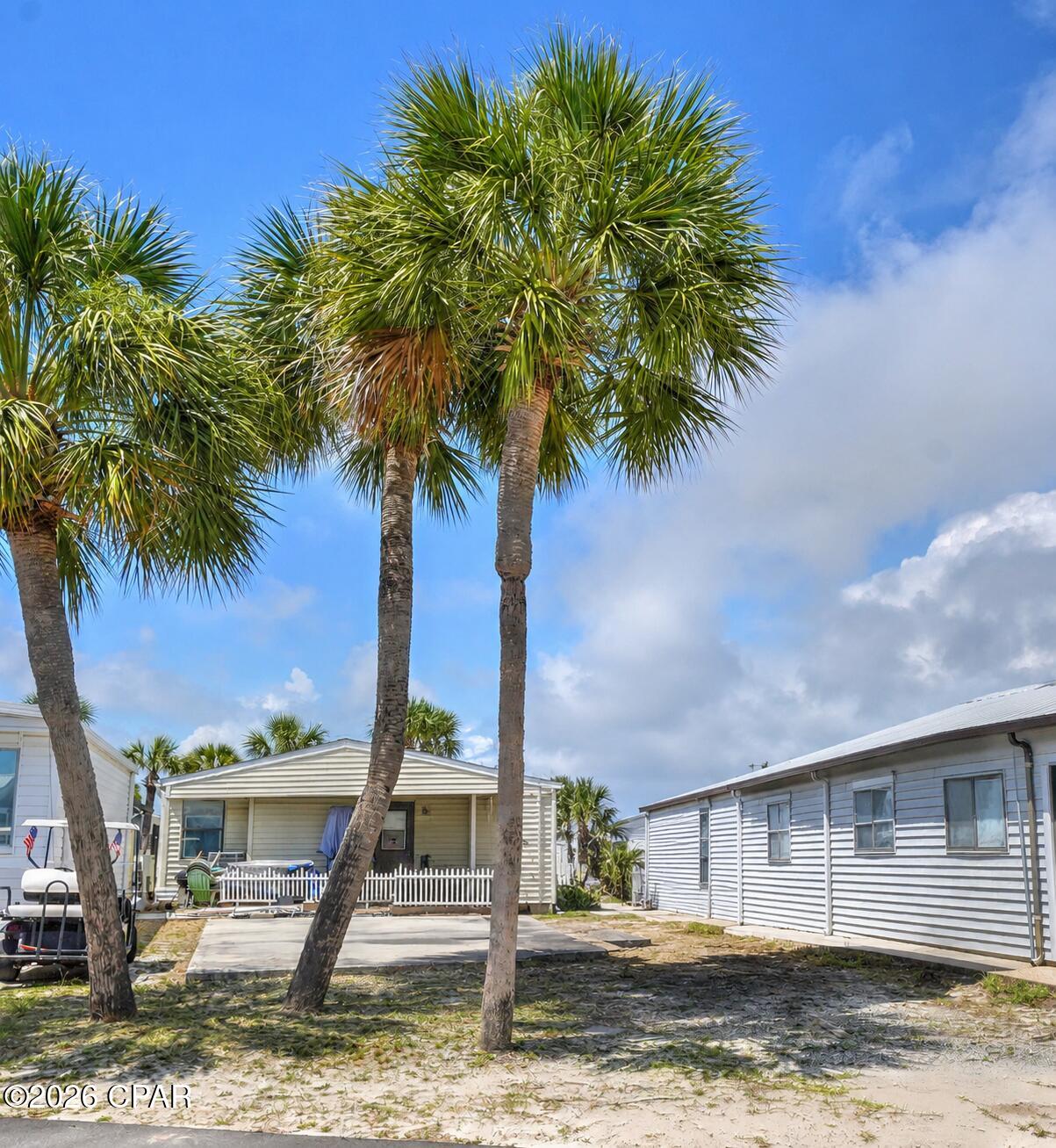 Build your dream beach getaway in the highly sought-after gated community of Venture Out Resort or bring your RV! This vacant lot located at 242 Barracuda Drive offers the perfect opportunity to create your ideal coastal retreat or investment property in one of Panama City Beach's premier golf cart communities. Conveniently situated near the beach and resort amenities, this property provides the perfect setting for enjoying the laid-back coastal lifestyle Venture Out is known for.

Venture Out features approximately 300 feet of private Gulf-front beach access and over 1,000 feet on Grand Lagoon, along with outstanding amenities including two swimming pools, tennis courts, pickleball courts, shuffleboard, basketball court, playground, fishing pier, private boat ramp, marina, picnic areas, and 24/7 gated security. Cruise the community by golf cart and enjoy easy access to the beach, boating, fishing, dining, and entertainment.

Whether you are looking to build a personal vacation home, second home, or income-producing rental property, this is a fantastic opportunity to own property in the heart of Panama City Beach. Don't miss your chance to be part of the Venture Out lifestyle!