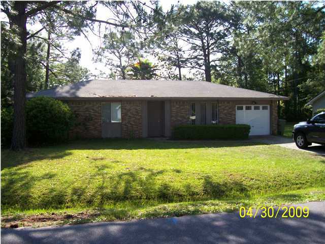 Great three bedroom home in Lynn Haven. This home features a 1 car garage, and a fenced in back yard. Also features an eat in kitchen, and vaulted ceilings in the living room.