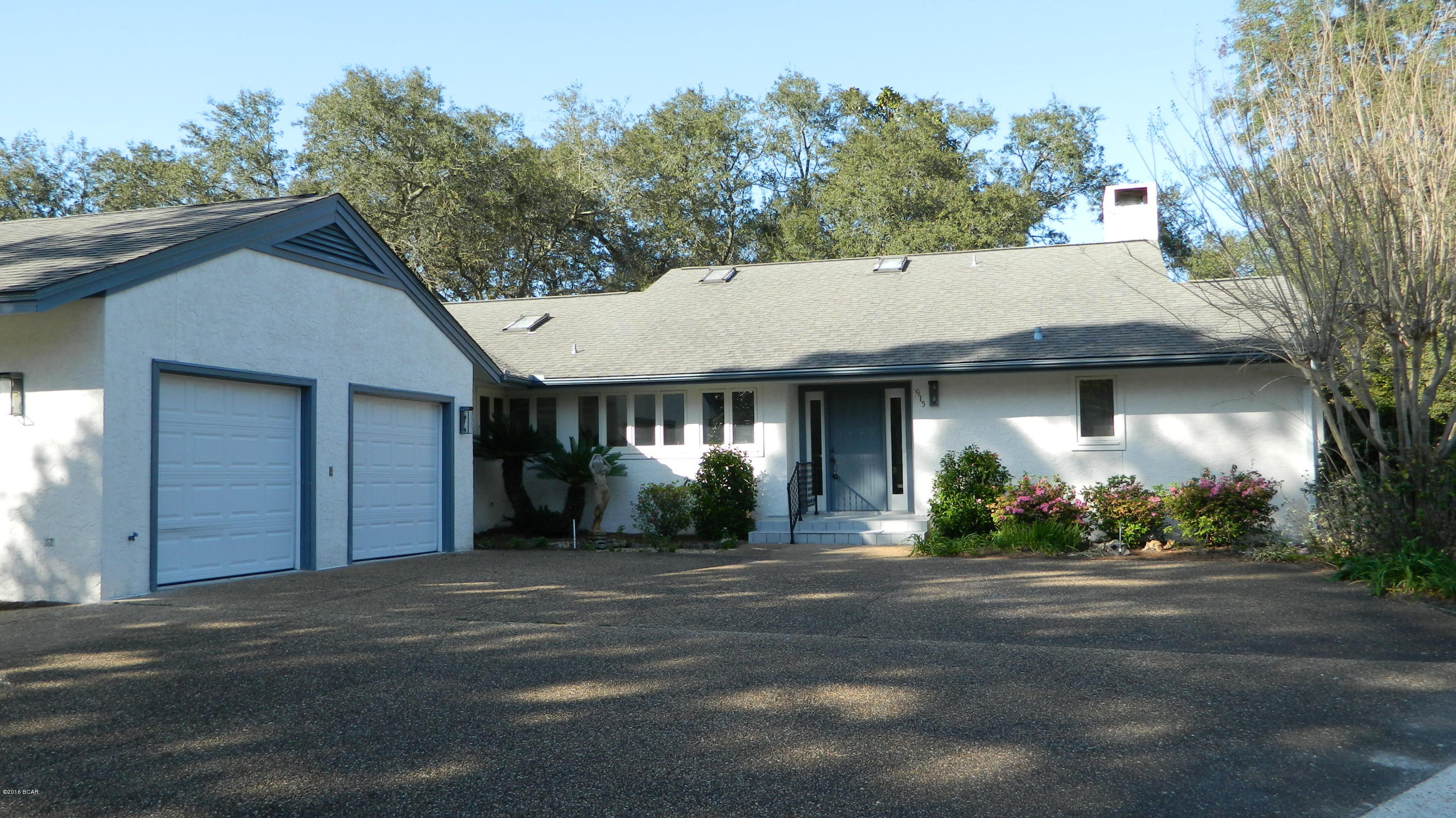 The 2 bedroom, 2 bath single family home with bonus office would be ideal for those looking for plenty of space and enjoy the beautiful outdoors. Great for entertaining, the home has a massive living room with wood-burning fireplace with mantle, and a wet bar equipped with wall shelving and sink. The kitchen has all appliances and overlooks the dining room and living area. There is a formal dining area with built-in shelving/drawers for china or added kitchen storage. The home features nice natural lighting with skylights throughout the living areas. It is a split bedroom plan with the large master bedroom on the West side of home. The connected master bathroom has a soaking Jacuzzi tub/shower and separate shower, large vanity, and huge walk-in closet. The master bedroom opens up to the  Florida Room or bonus living room. All of the living space is open and flows well. 2-car garage. Washer/Dryer included. Rent includes lawn service and pest control. **Pets Negotiable with $250 non-refundable Pet Fee**