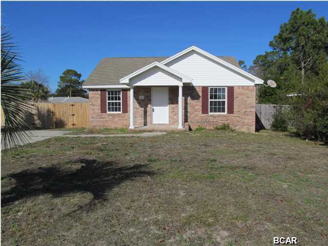2 bedroom 2 bath home open living area with fenced back yard- home is on septic -Convenient location to beach and Pier Park.