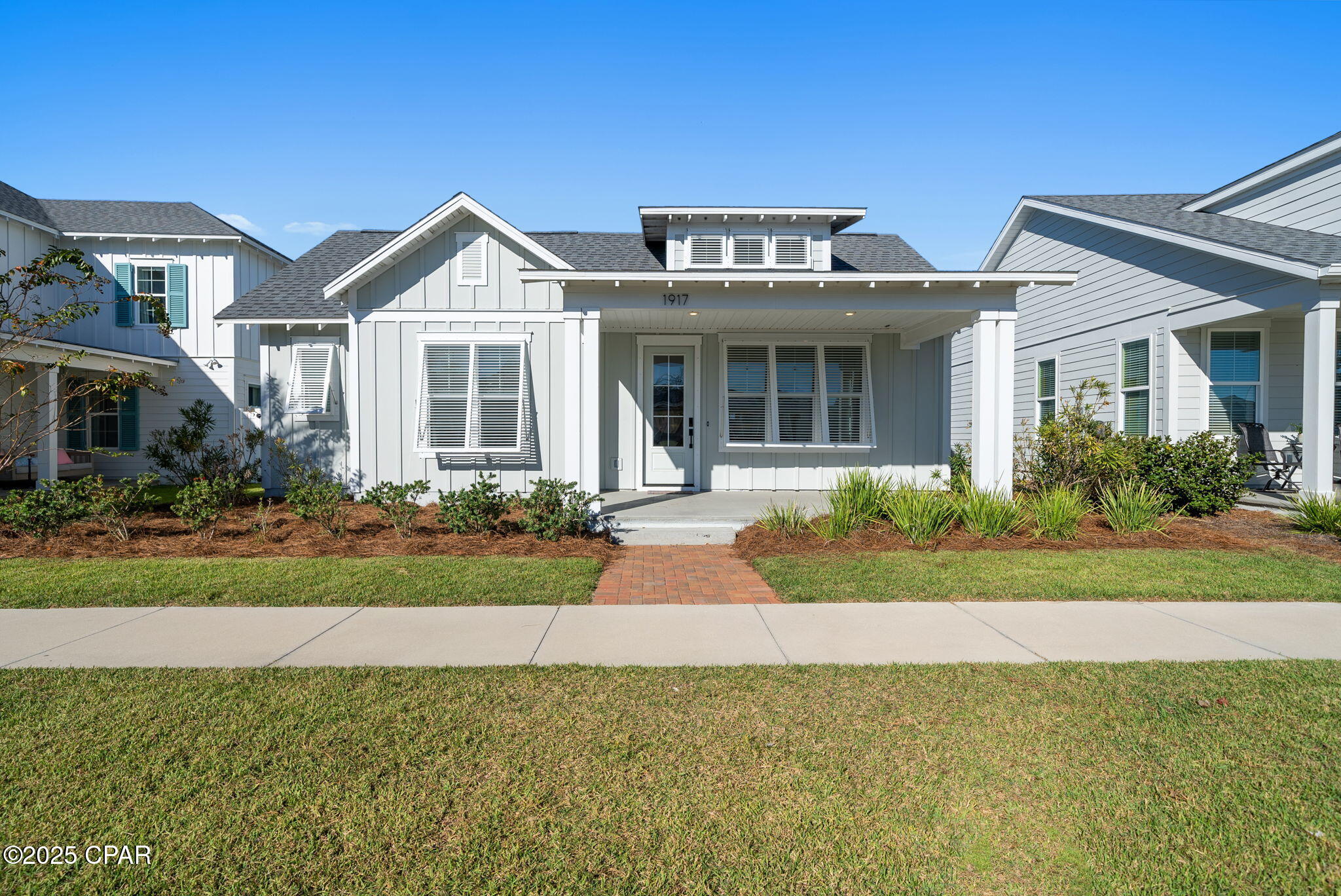 $5500 LENDER CREDIT OFFERED! INQUIRE FOR MORE DETAILS! 

Experience Luxury Living in SweetBay!

Welcome to this stunning St. Andrews floor plan--one of SweetBay's most popular designs--offering 4 bedrooms, 3 baths, and an attached garage in a prime location directly across from the resort-style pool!

Step onto the inviting covered front porch, complete with bahama shutters and into a bright, open foyer that flows seamlessly into the elegant dining area. The gourmet kitchen is a chef's dream, featuring quartz countertops, stainless steel appliances, a spacious center island, and abundant cabinetry. The open-concept design connects the kitchen to the comfortable family room, creating the perfect setting for entertaining or relaxing with family.

Retreat to the serene master suite, complete with a tray ceiling, walk-in closet, dual vanities, and a luxurious oversized shower. Outside, enjoy a private backyard oasis with a covered porch, astroturf  and vinyl privacy fence--ideal for outdoor dining, play, or quiet evenings under the stars.

Living in SweetBay means more than just owning a home--it's embracing a lifestyle. Residents enjoy access to two resort-style pools, scenic parks, a basketball court, amphitheater, and miles of walking and biking trails. Spend your weekends paddleboarding or kayaking on North Bay, and look forward to the exciting future addition of a town center and marina with wet and dry boat storage.

This beautiful home is move-in ready and perfectly positioned to enjoy everything SweetBay has to offer. Schedule your private tour today and start living the lifestyle you deserve!