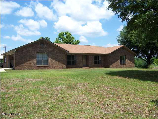 ATTENTION HUNTERS & CATTLEMEN.. THIS IS A ONE OF A KIND PROPERTY .. PERFECT FOR LIVESTOCK & PLENTY OF WILD GAME!  88.20 acres that is perfect for raising cattle, mini farm, or just your personal hunting paradise. Acres consisting of rolling hills, fenced pasture, crop land,large oaks throughout and a pond.Spacious home is secluded and nestled on the 88.20 acres.Brick home w/open floor plan, cathedral ceilings, large living room with a large wood burning fireplace and a formal dining room. Kitchen was updated in 2011 with new appliances and the kitchen also features an eat in area. The expansive master suite leads to spacious Florida room which opens to the back yard and pool area. Other features: