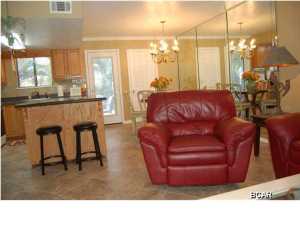 If you are L@@King for that Awesome unit in Gulf Highlands Beach Resort that backs up to the Mini Golf Course & a Pool... Here it is!!!! This is a Beautifully Decorated & Remodeled 2 Bedroom 2.5 Bath unit. This ''Gated Resort'' features 11 Pools (5 Heated), 4 Tennis Courts (2 Lighted), An 18 Hole Putt Putt Golf Course, several Shuffleboard Courts, a Conference Center, Fitness Center, Wi-Fi rooms, and a Clubhouse with a Pool directly on the Beach... there is NO EXTRA CHARGE to use any of these amenities. This Resort is great for Walking, Jogging, and Bike Riding. You even own the 2 Parking Spaces in front of your unit along with the Front & Back Yard. NO Elevators to wait on and NO hunting for a Parking Space! This is not a ''Condo'', so they are much easier to get a loan on. The HO
