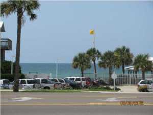 As close to one of the world's most beautiful beaches as you can get without being literally on the beach! It's not only close to the beach but also down the street from Pier Park where there are lots of restaurants and shops! And close to Frank Brown Park, which features all kinds of sporting opportunities! This affordable two bedroom is the perfect place to have as a weekend getaway or rental. This unit is clean as a whistle and very tastefully decorated. It has a sleeper sofa, tile in the main and wet areas, and conveys completely furnished and rental ready! Step out the front door and see the Gulf, hear the crashing waves and feel the breeze! When tired of the beach (can't imagine) you can relax by the community pool. It's all right here for a great price!