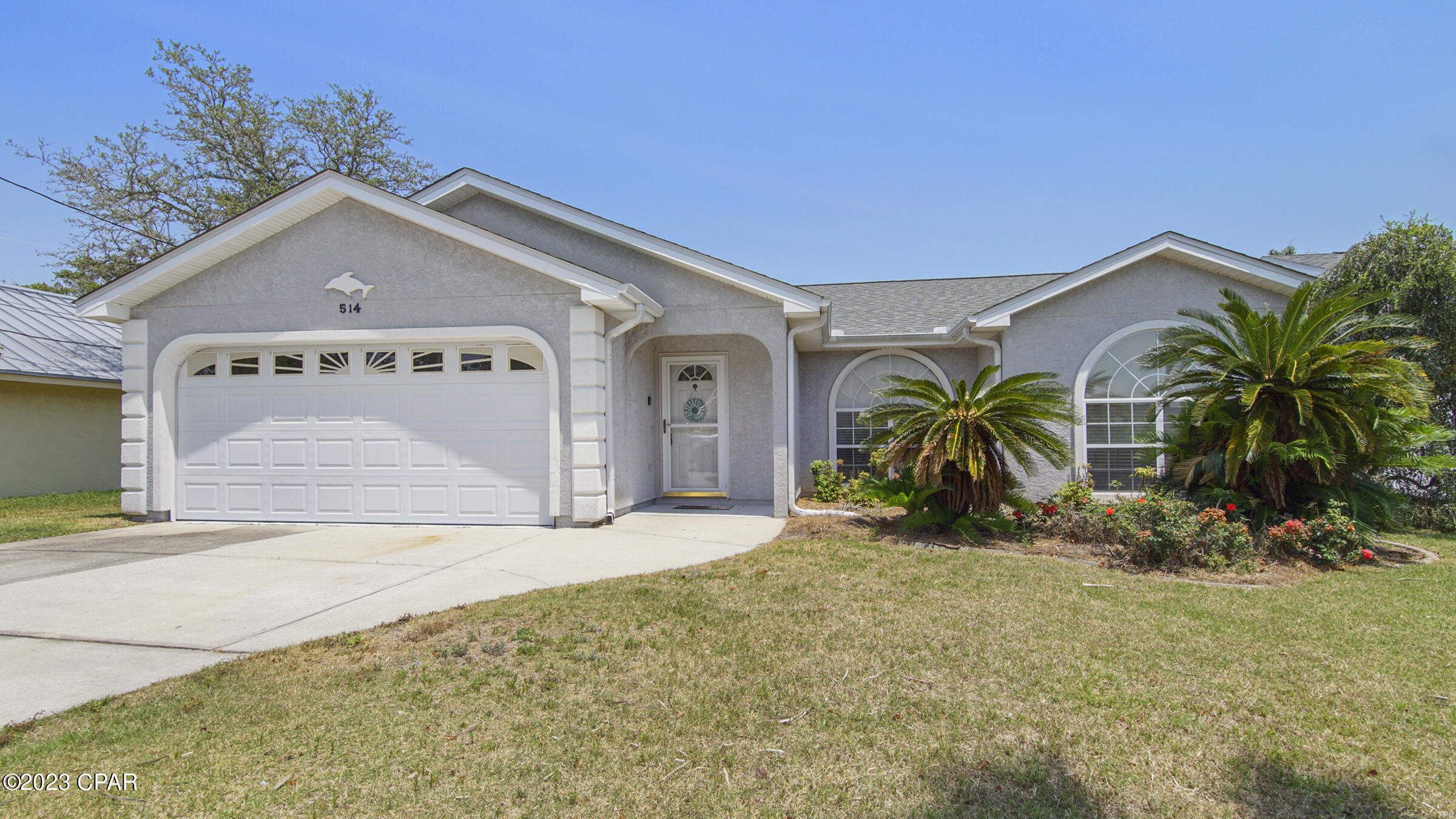 This fantastic 3-bed, 2-bath furnished home is just 4 short blocks from public beach access and under 3 miles from Pier Park. You'll have a blast with the nearby restaurants, shopping, and beach fun. The spacious living area, separate dining room, and well-equipped kitchen are sure to impress. The primary bedroom is roomy, and there's a nice attached bathroom. The two other bedrooms are spacious. Plus, it's pet-friendly! Live the easy beach life in PCB with a big fenced yard, screened patio, and lovely landscaping. 🌴