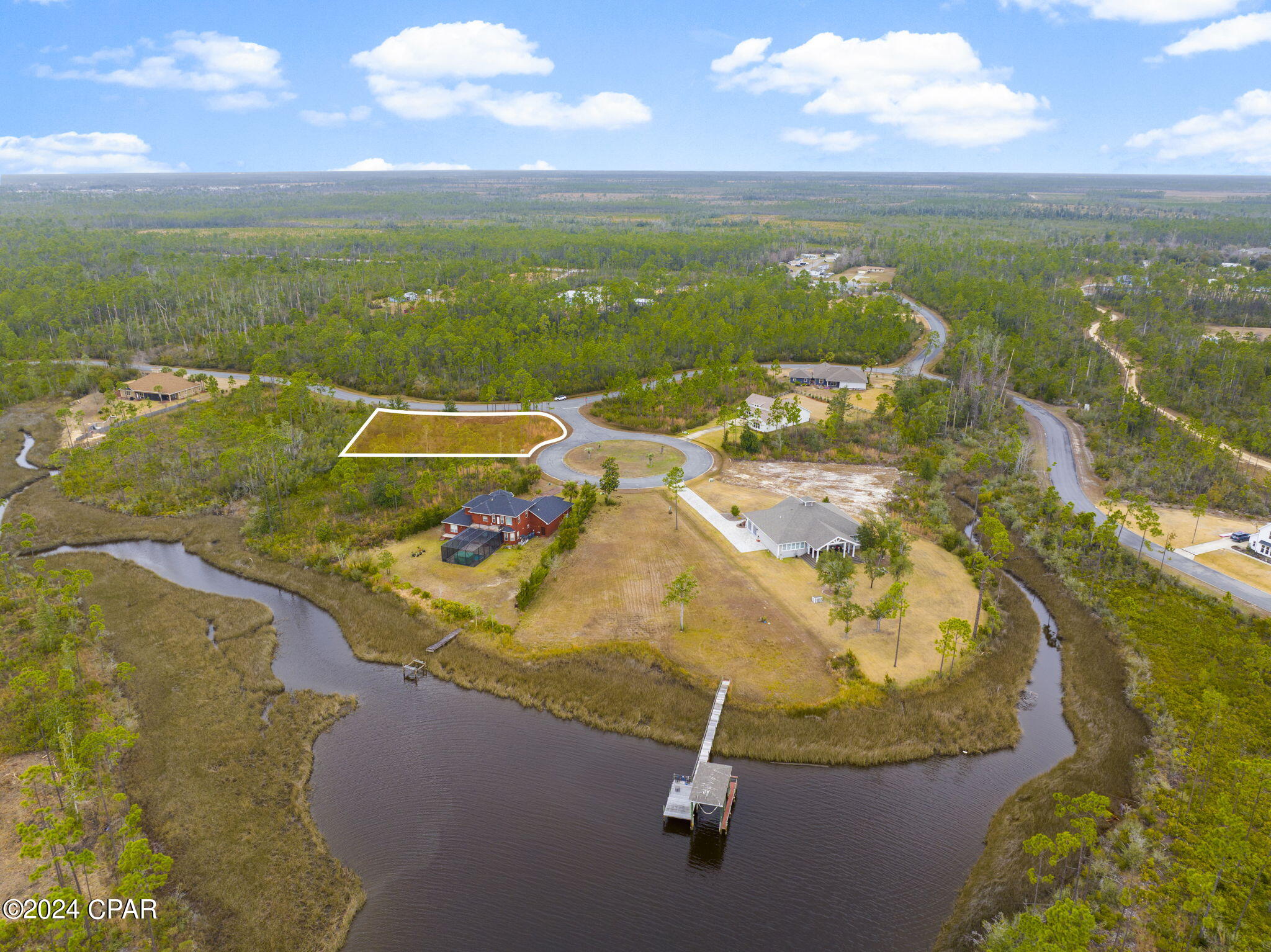 Back on the market due to buyer not being able to qualify for their loan.  Welcome to the perfect canvas for your dream coastal retreat! This vacant land, spanning over half an acre, is nestled in the prestigious Laird Bayou community, offering a rare opportunity to build your custom oasis in a serene and gated neighborhood.
This property is situated on a generous corner lot in a quiet cul-de-sac, providing not just a home but a lifestyle enriched by the privacy and tranquility of this prime location, surrounded by lush greenery and the soothing sounds of nature.
In this idyllic community, you'll have the convenience of a boat launch at your disposal, allowing you to indulge in the freedom of waterfront living. Explore the pristine waters of Laird Bayou and beyond. 
Security and exclusivity are paramount, with the property being part of a gated community. This ensures a safe and private environment for you and your loved ones. To further enhance your leisure, the community boasts a pool, inviting you to relax and cool off on hot days or enjoy a leisurely swim.
This property offers a unique opportunity to embrace the coastal lifestyle you've always dreamed of. Design and build the home you've envisioned with the stunning backdrop of Laird Bayou as your canvas.
Details of the property include a size of over half an acre, categorized as vacant land, and boasting a special feature of a corner lot in a cul-de-sac location.
Don't miss out on the chance to own a piece of paradise. Seize this opportunity to create lasting memories in Laird Bayou - where every day feels like a vacation.
Call today to schedule a private viewing and begin the journey to your dream home!