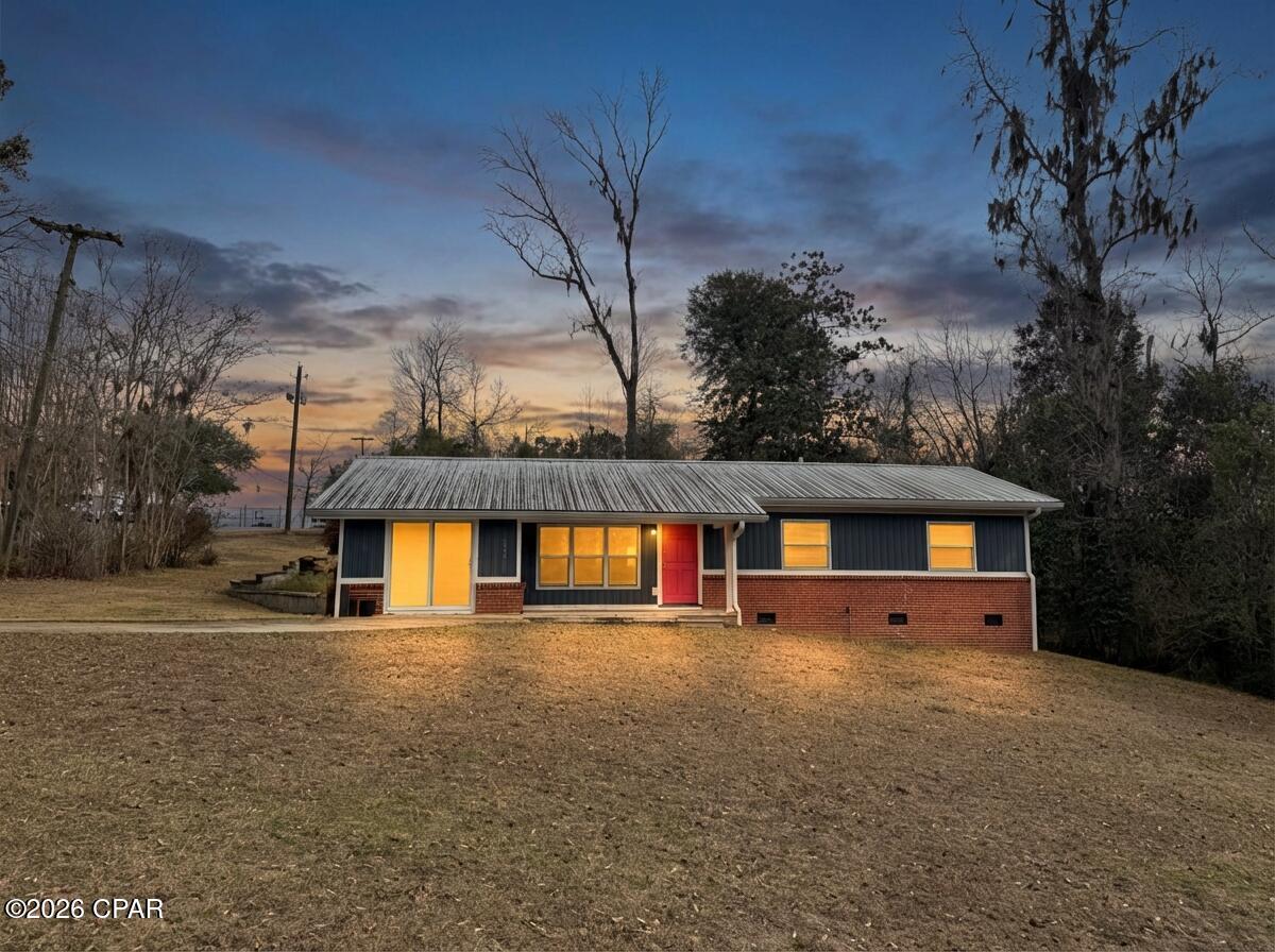 Welcome to this beautifully updated 4-bedroom, 2-bath brick and vinyl home perfectly situated on a desirable corner lot in the heart of downtown Marianna. Blending classic character with modern updates, this home features freshly painted interiors, refinished original hardwood floors, and stunning granite countertops that add both style and functionality to the kitchen.

Designed for comfortable living and entertaining, you'll love the versatility of two spacious living areas and two dining spaces—ideal for gatherings, holidays, or simply spreading out. One of the living rooms features a sliding glass door that opens to a generous backyard complete with a storage shed, offering plenty of room for outdoor enjoyment, gardening, or play.

The fourth bedroom is a standout feature, boasting its own exterior slider door that fills the space with natural light. Whether you envision a home office, hobby room, homeschool space, guest suite, or flex room, this area offers endless possibilities.

With its prime location, thoughtful updates, and flexible floor plan, this downtown gem is ready to welcome you home.