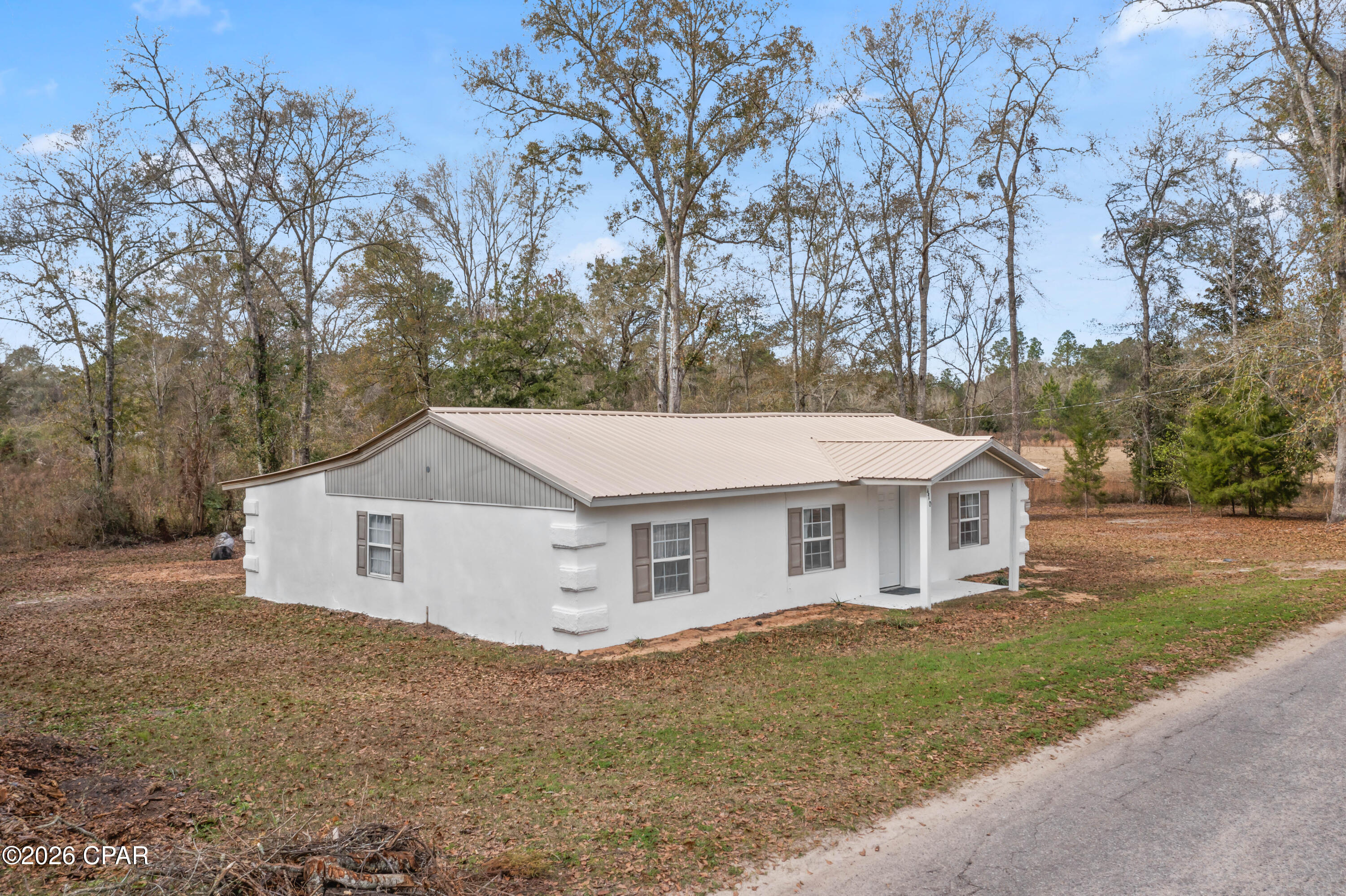 Welcome to this beautifully updated 4-bedroom, 2-bathroom home offering 1,481 sq ft of modern, comfortable living space in the heart of Chipley, Florida - conveniently located within city limits for easy access to local amenities.

This home has undergone a complete remodel with high-quality recent updates throughout, making it truly turn-key and perfect for families or anyone seeking low-maintenance Florida living. Step inside to discover stunning all-tile flooring that flows seamlessly from room to room - durable, easy to clean, and stylish.

Bright and energy-efficient LED lighting and new ceiling fans have been installed in every room, creating a fresh, inviting atmosphere. Stay comfortable year-round with a brand-new HVAC system and water heater. Fresh interior and exterior paint gives the home exceptional curb appeal and a like-new feel.

Both bathrooms have been fully remodeled with modern finishes, including elegant new vanities, fully tiled showers and bathtubs, and updated toilets. An additional bathroom was thoughtfully added during the renovation, providing the convenience of two full baths for a growing household.

Enjoy the best of Northwest Florida living: just 40 minutes from Dothan, AL, and less than an hour from the sugar-white sands and emerald waters of Panama City Beach. Whether you're heading to the coast for a weekend getaway or running daily errands in town, this location offers the perfect balance of small-town charm and proximity to bigger destinations.

Priced to sell and ready for its new owners