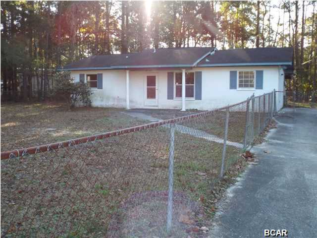 REDUCED!!! Block three bedroom two bathroom house near Tyndall Parkway offered as is. The property needs some TLC but has great potential as a rental or starter home. All sizes are approximate please verify if important.