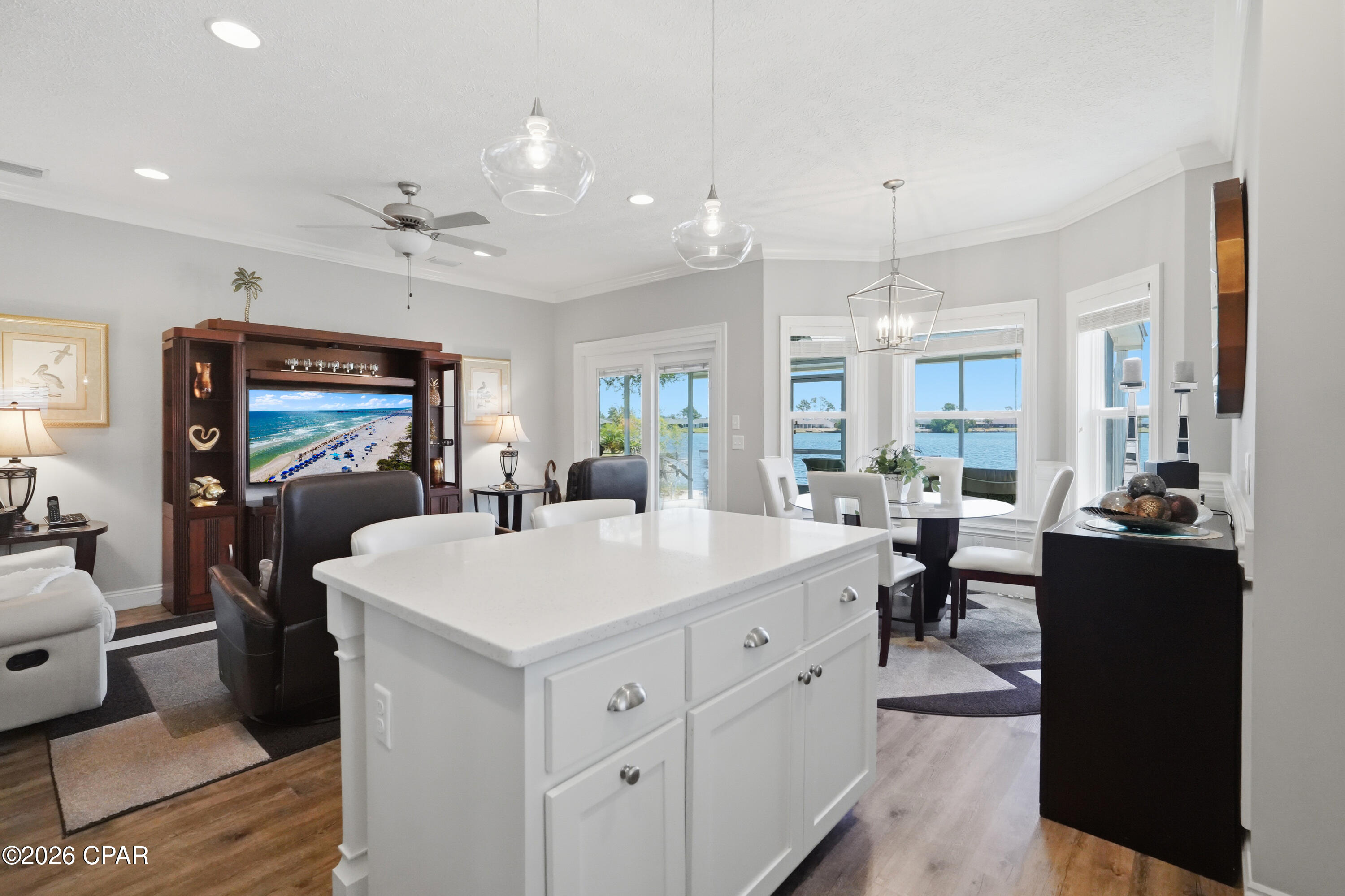 Did you say waterfront? Life on the water becomes your everyday backdrop in this beautifully updated waterfront home, where you can swim, fish, boat, or paddleboard right from your backyard. Designed to embrace both comfort and lifestyle, the home features 9-foot ceilings that create an open, airy feel, along with thoughtful upgrades throughout that elevate both form and function.
Recent improvements offer peace of mind and modern efficiency, including a 2019 roof and a 2023 hot water recirculator for added convenience of warm water almost instantly. The outdoor living experience has been enhanced with a 2023 screened in lanai, perfect for enjoying tranquil water views and coastal breezes. Inside, updated appliances in 2023, custom pull-outs, an air purifier (2023) integrated into the HVAC system adding an extra layer of comfort.
Additional upgrades include a slider with a lifetime warranty, elegant crown molding, quartz countertops, cabinet pull outs, . Even the natural surroundings add to the charm, with local wildlife like turtles often making an appearance along the water's edge.
Perfectly located in the heart of Panama City, this home places you just minutes from historic downtown Panama City, the charm of historic St. Andrews, and the white sand beaches of the Gulf. Everyday conveniences like shopping and dining are close by, while your own backyard offers a private waterfront escape that feels like a world away.