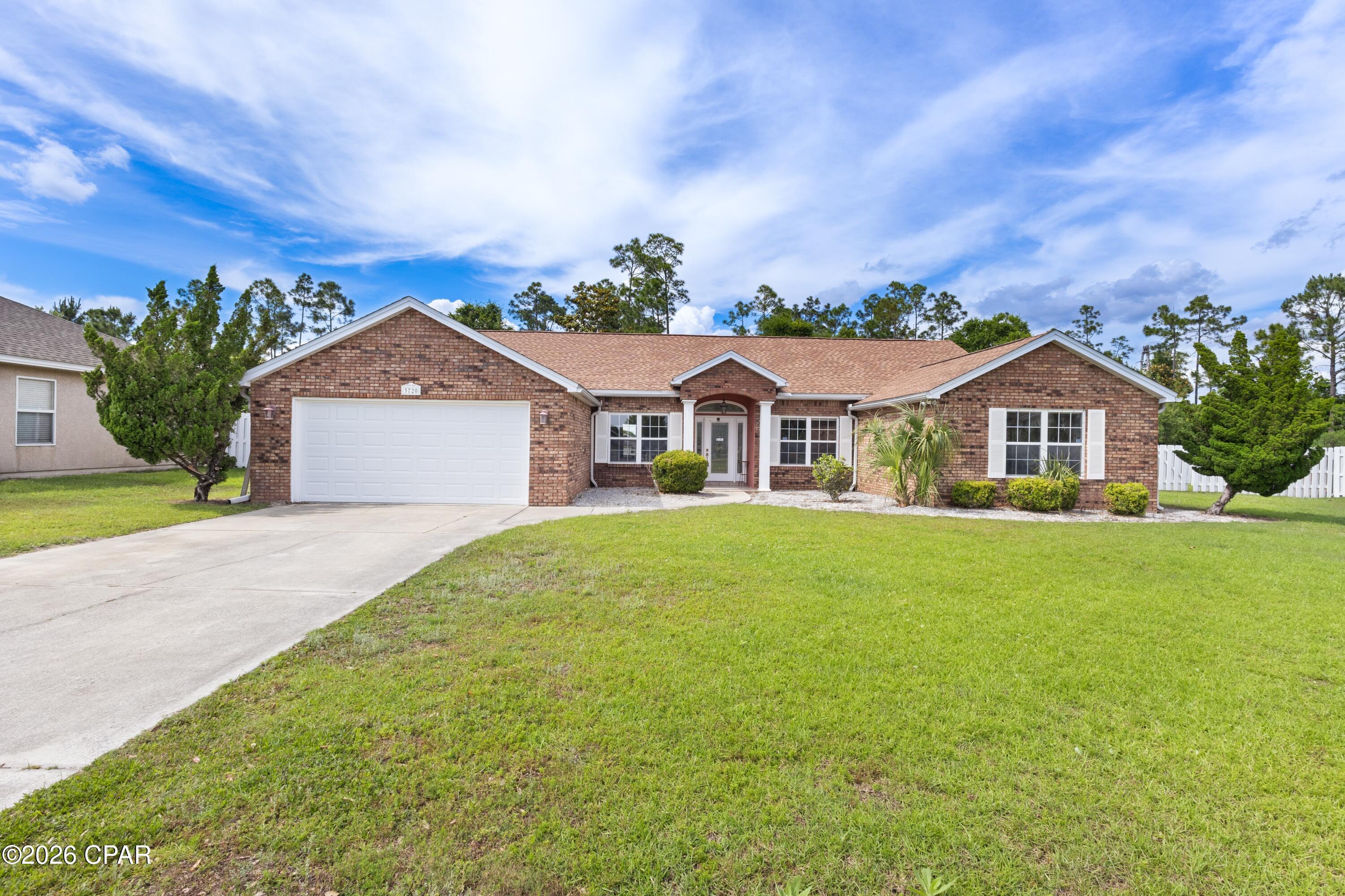 Welcome to your private slice of Florida paradise in desirable Lynn Haven. This beautifully refreshed pool home offers space, privacy, and thoughtful updates, all tucked away on a generously sized lot backing to a natural wooded setting with no rear neighbors.
Step inside to soaring ceilings, abundant natural light, and an airy open concept layout designed for comfortable everyday living and effortless entertaining. Fresh interior paint gives the home a crisp, move in ready feel, while spacious living areas flow seamlessly into the kitchen and out to the backyard retreat.

The kitchen features stainless steel appliances, abundant cabinetry, generous prep space, and a functional layout overlooking the main living area and pool, keeping everyone connected. A formal dining or flex space at the front of the home offers versatility for entertaining, a home office, or additional sitting area.

The oversized primary suite is a true retreat with dual vanities, a soaking tub, and a beautifully renovated spa inspired walk in shower with designer tilework and modern finishes.

Out back is where this home truly shines. Enjoy your oversized screened private pool enclosure with a sparkling in ground pool, expansive patio space, and the privacy buyers dream of. The large fenced backyard offers room for pets, play, or gardening. As an added bonus, residents also enjoy access to a community pool.

Additional highlights include a spacious laundry room, storage shed, vaulted ceilings, no rear neighbors, and a prime location near Bay Haven Charter Academy, shopping, dining, parks, beaches, and more.