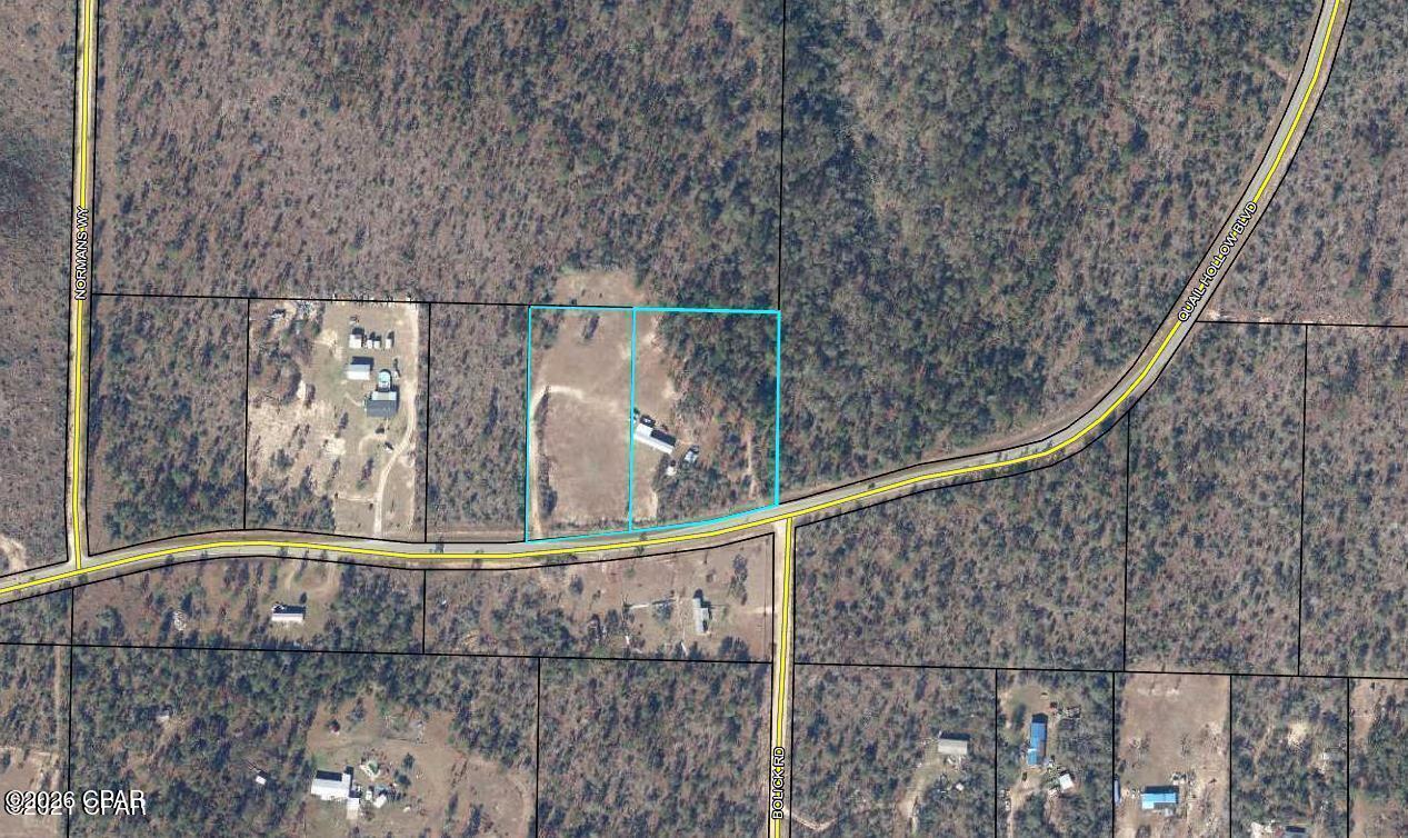 Unrestricted 3.76-acre property offering privacy, flexibility, and multiple use options in a quiet rural setting just south of Chipley. This unique offering includes two adjacent parcels (survey available) on a paved road with no HOA or restrictions--ideal for a homesite, investment, or multi-family setup.

Existing improvements include a 1993 3BR/2BA single-wide mobile home (14x76) with metal roof, a large metal building perfect for workshop/storage, and two additional outbuildings--one with potential for conversion into a recreational space or guest quarters.

The land itself is the true highlight, providing plenty of room to build, expand, or bring in additional homes. Enjoy peaceful surroundings with no nearby neighbors in view while still being within reasonable driving distance to town.

Parcel included: 00000000-00-0002-0075.