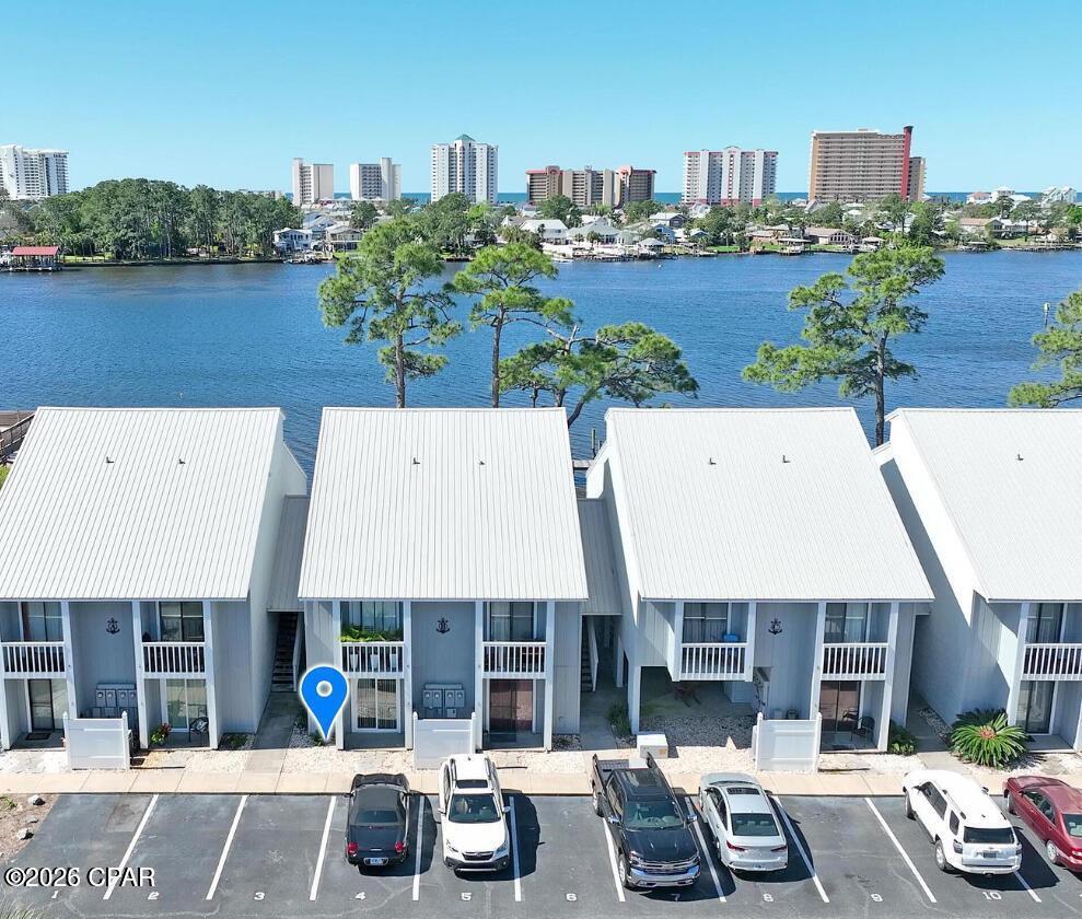 MOTIVATED SELLER! BRING ALL OFFERS!!! Make every day feel like a getaway in this charming first-floor condo! Designed with an open-concept layout, this cozy home offers effortless comfort and flow. Step out onto your private balcony to enjoy spectacular lagoon sunsets. Whether you're fishing, watching dolphins play, or heading to the Gulf (with easy water access) this is true coastal living. Call today for a private tour!