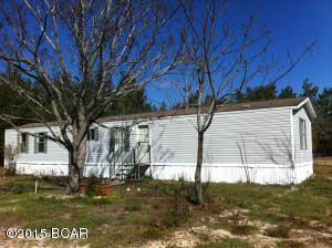 ESCAPE TO THE COUNTRY....This single wide mobile home has approximately 1.2 acres and is set back from the road for privacy. Fencing already in place. Quite and peaceful setting. Relax in the country just minutes from town. 3 BR/2BA.