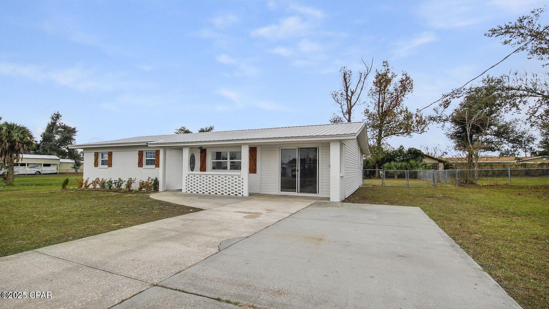 **CURRENTLY UNDER CONTRACT, SELLER WILL CONSIDER BACKUP OFFERS**

Step into this updated 4-bedroom, 2-bathroom home offering just under 2,000 square feet of stylish living space. Located on one of the largest lots in the neighborhood, this property provides modern updates and best of all, NO HOA! 

From the moment you arrive, you'll appreciate the spacious layout, upgraded finishes and thoughtful design.  With its prime location, large yard, and attractive price, this home is priced to sell. Schedule your showing today and make 204 Lannie Rowe yours! 

**Two bedrooms have some flooring damage, Seller is offering to replace prior to close or a credit to buyer**