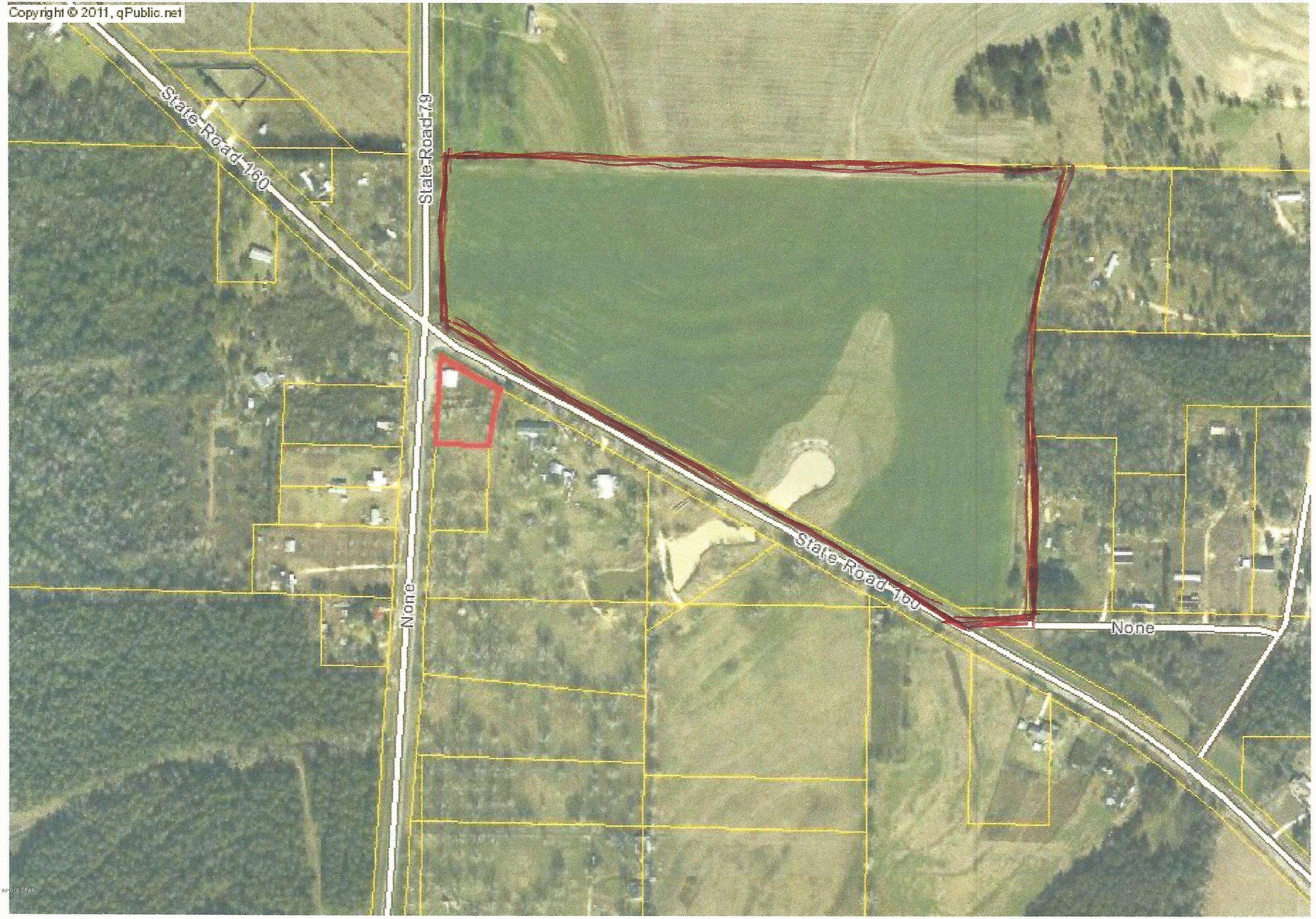 38 Acres more or less vacant land.  Cleared pasture land. Frontage on 2 paved roads. Short distance to town.