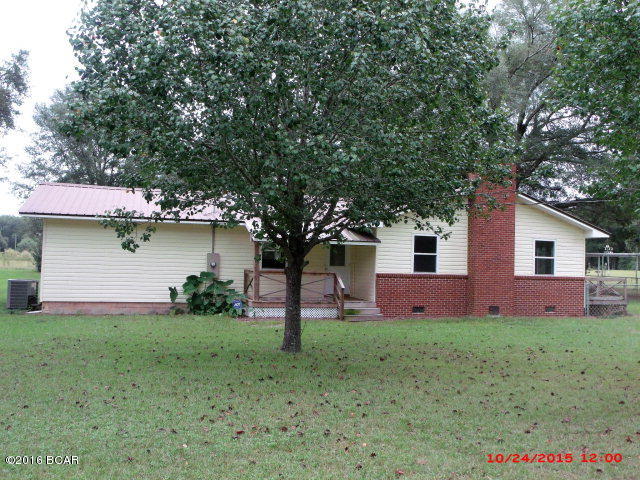 Beautifully renovated, like new home on 1.77 acres just North of Greenwood. Home features updated kitchen with lots of cabinets and counter space, hardwood floors in the living room, with french doors that provide more light and lead out to the fenced in side yard. There is 1 full bath and 2 half baths. Outside features nice big yard with several shade trees, attached carport and storage shed. If you are looking for a very nice, move in ready home, close to all amenities, this is the one! Please make an appointment today.