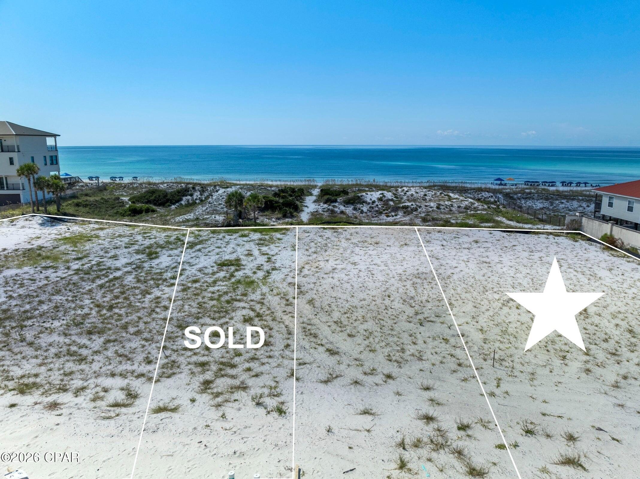 Positioned at the edge of exclusivity, this premier Gulf-front homesite within Casa Magnolia represents one of the most distinguished offerings along the shores of Miramar Beach. As one of only four Gulf-front opportunities in this gated, boutique community, this exceptional property offers a rare and compelling canvas to create a world-class coastal estate. As a premier corner homesite positioned along the outer edge of the community, this offering provides enhanced privacy, expanded dimensions, and a more commanding Gulf-front presence. With its larger footprint and exceptional positioning, the homesite allows for a more dynamic architectural design, maximizing panoramic Gulf views while creating expansive indoor & outdoor living spaces.

Spanning approximately 11 acres, Casa Magnolia is an intimate enclave where timeless architecture meets the natural beauty of the Emerald Coast. With just 30 interior homesites and 4 Gulf-front lots, opportunities of this caliber are extraordinarily limited.

Design and build your legacy residence with the potential for up to 8,500 sq ft, complete with a private pool, multiple terraces, and thoughtfully curated outdoor environments designed to embrace the rhythm of coastal living. Whether as a primary residence, second home, or luxury investment, this homesite offers a level of scale, flexibility, and exclusivity rarely found in new Gulf-front developments.

Casa Magnolia's architectural vision ensures a cohesive and refined aesthetic, featuring white brick exteriors, dimensional metal roofing, natural wood accents, and elevated finishes that reflect both sophistication and relaxed coastal elegance.

Residents enjoy exclusive access to over 300 feet of pristine, sugar-white sand via a private beach gateway, along with a suite of upscale amenities including a resort-style pool with water feature and bathhouse, a beautifully appointed clubhouse, and a recreational lawn ideal for gatherings and leisure. Additional offerings such as a dedicated dog park, off-beach storage, and concierge services further enhance the effortless lifestyle.

With short-term rental allowances (one-week minimum) and a five-year buildout requirement, Casa Magnolia strikes a thoughtful balance between investment potential and long-term community integrity.

This is more than a homesite, it is a rare opportunity to secure a premier position within one of the Emerald Coast's most refined Gulf-front communities. From sunrise reflections to breathtaking sunsets, every moment here is framed by the beauty of the Gulf.

A truly exceptional offering for those who demand the extraordinary.