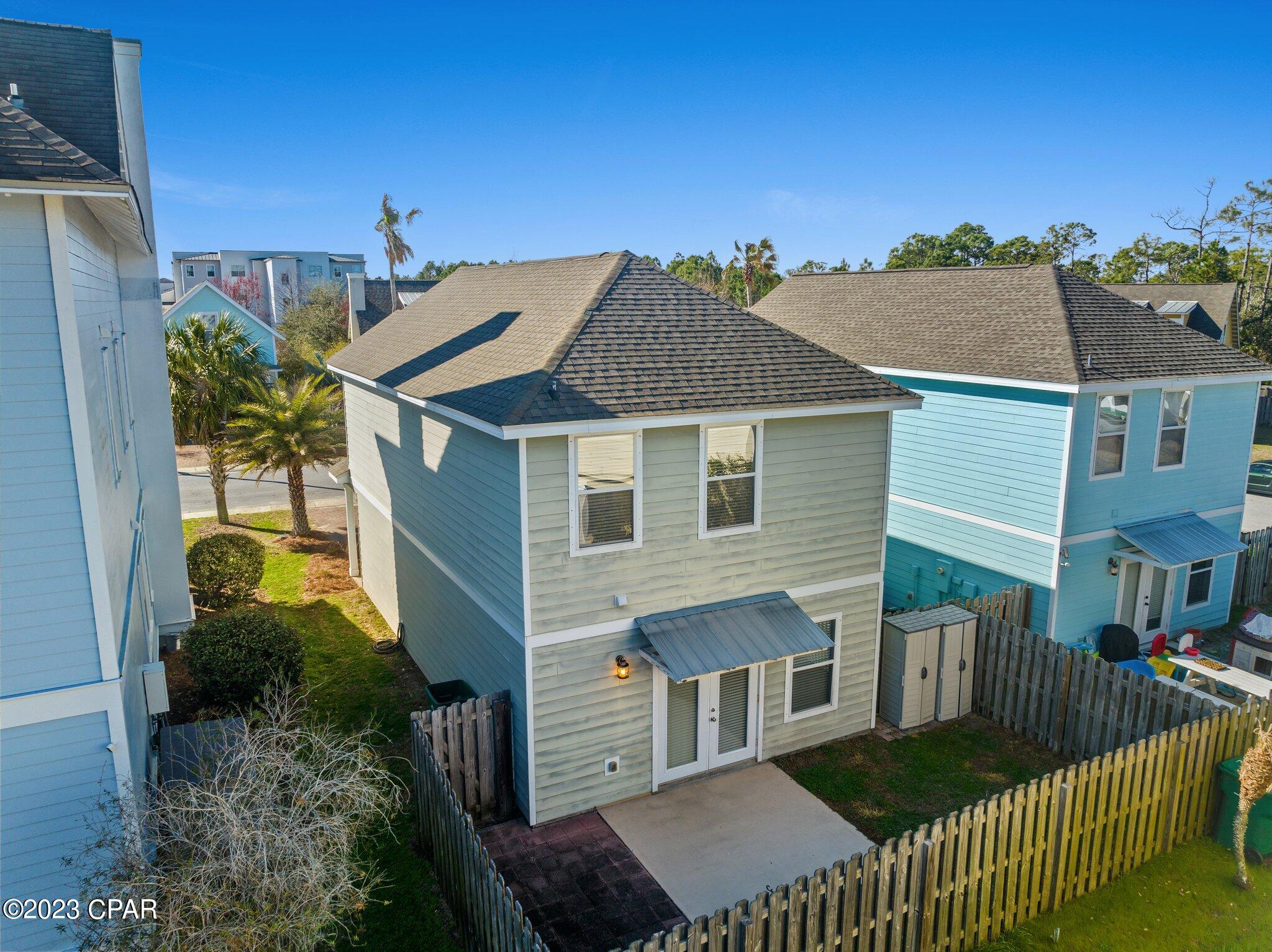 BIG PRICE REDUCTION!! Don't miss out this big opportunity.. This is your time to live or invest in the heart of Panama City Beach. Welcome to 335 Madison Circle. This Wonderful Florida cottage is situated in a quiet peaceful community conveniently located near the best shopping and dining, less than a mile from the beach and 3.5 miles from Pier Park Mall.This home features 3 bedrooms, 2 1/2 bathrooms, large pantry, brand new microwave, dishwasher and A/C unit from 2022...The backyard is completely fenced providing privacy. Harrison's walk low HOA included trash disposal and community pool. Schedule your private showing today!!