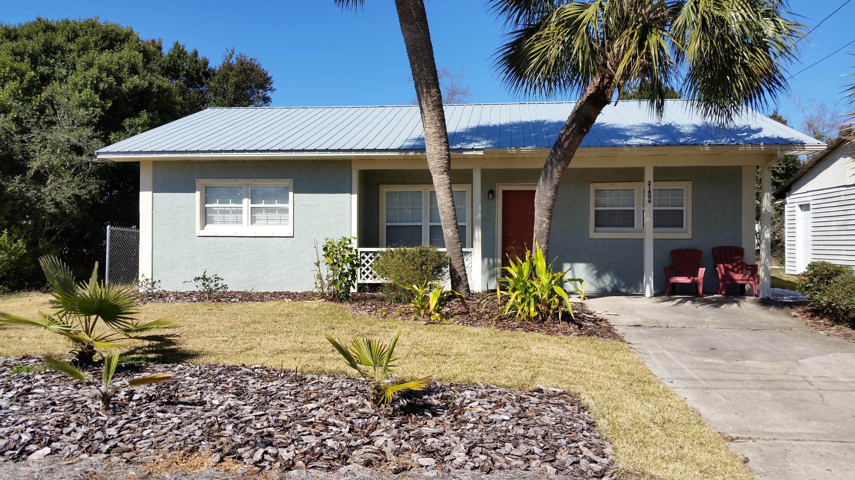 If you are looking for a COMPLETELY FURNISHED beach getaway, a vacation rental or just a beautiful home for your residence, look no further! This adorable 4 bedroom, 3 bath, beach home is only 2 short blocks from our amazing white sandy beaches! When you pull up to the home, you will notice the beautiful landscaping and great curb appeal this home has. This home was completely remodeled in 2010 with new everything from top to bottom! All new windows, flooring, doors, trim, central heat and air, roof, septic tank and much, much more! The home is completely furnished with very nice furnishings & everything you need to move right in! The kitchen has beautiful cabinets, granite counter tops, tiled backsplash and Stainless appliances. The Master Suite is huge, with a large bathroom and walk in closet. The 3 additional bedrooms are all nice sized as well, and 1 is complete with another full bathroom. The living room is open and spacious along with a large dining area that is great for entertaining family and friends. This home has it all and is located just two blocks away from the sandy white beaches of Panama City Beach! This beach home is a must see, so make plans to view it today!