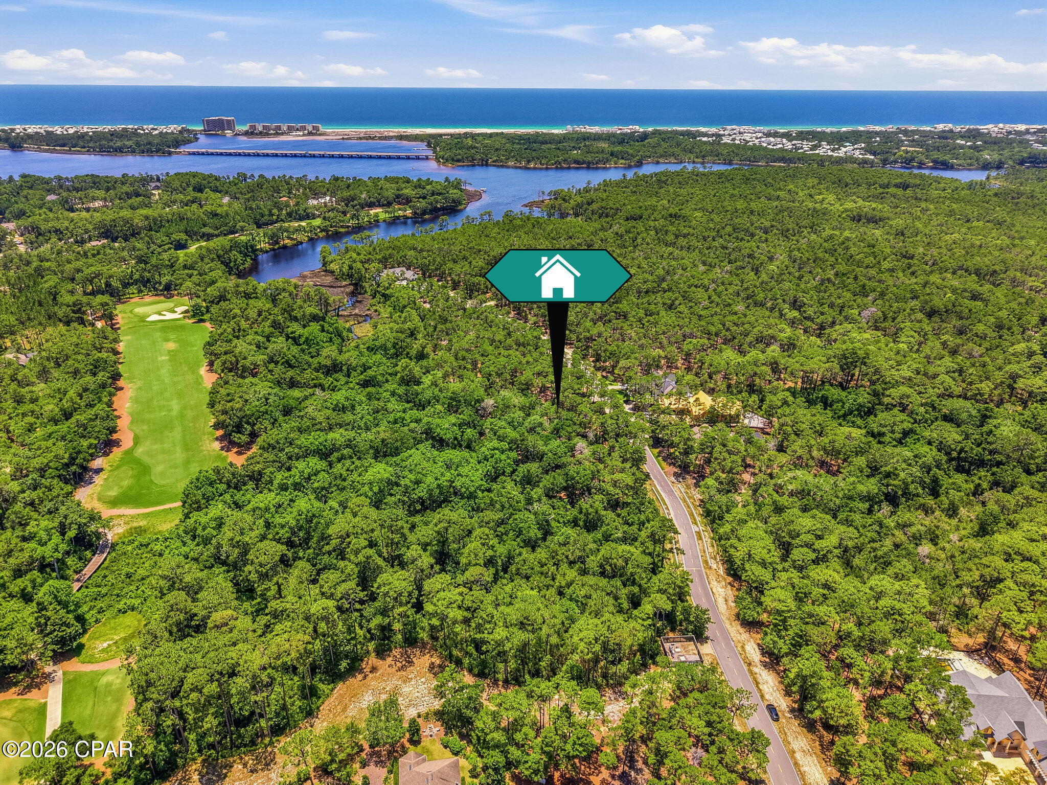 Tucked behind the private security gates of Wild Heron, this exceptional homesite spans nearly half an acre and enjoys a serene setting bordered by lush natural vegetation along the renowned Shark's Tooth Golf Course. Encompassing more than 734 acres with frontage on the rare coastal dune Lake Powell, Wild Heron is celebrated as the coastal sanctuary for its seamless blend of luxury amenities, distinctive architecture, and preserved natural beauty. Residents enjoy an unparalleled lifestyle where tranquil surroundings, championship golf, and the area's unique coastal ecosystem come together in perfect harmony. 

Community amenities include a lakefront boathouse and dock, heated pool and hot tub, family park area, walking paths, health club, and lakeside fire pit. Residents also have the opportunity to access the Shark's Tooth Golf Course designed by Greg Norman and hydro-clay tennis facilities through a Clubs by Joe membership. NO short term rentals or long term rentals allowed.