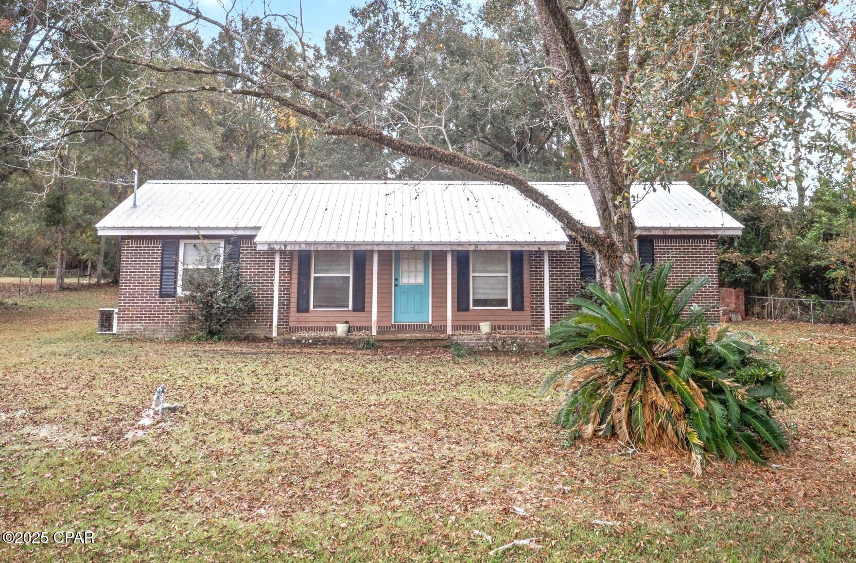 Discover the charm and convenience of this inviting 3-bedroom, 1-bath brick home set on 0.514± acres along South Blvd. With its classic curb appeal, spacious lot, and welcoming exterior, this property offers a warm first impression and a wonderful place to call home. Inside, you'll find a bright and spacious kitchen featuring warm wood cabinetry, ample counter space, and a convenient layout perfect for everyday cooking or entertaining. The adjoining dining area provides plenty of room for family meals and gatherings. All three bedrooms are nicely sized, offering flexibility for guests, children, or a home office. The full bathroom is centrally located for easy access. Outside, the home includes an attached carport plus plenty of yard space for outdoor enjoyment, gardening, or future improvements. Whether you're a first-time buyer, an investor, or someone looking to downsize, this well-maintained home presents a wonderful opportunity with plenty of potential.
