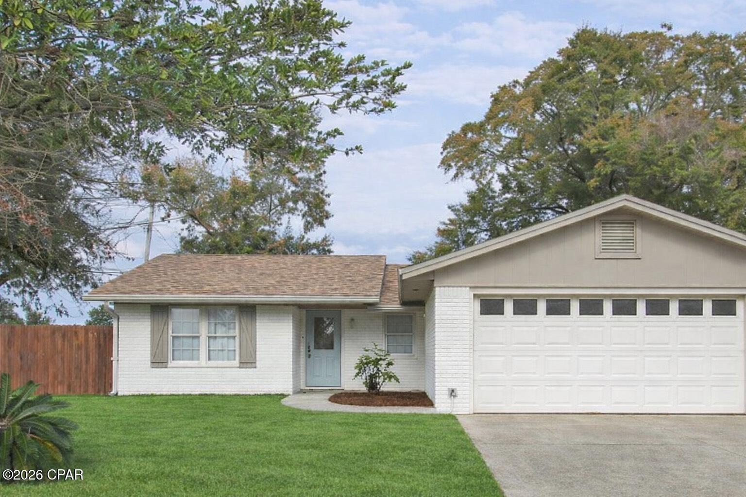 Welcome to this stunning brick home 3/2, CORNER LOT, ideally located just minutes from the Hathaway Bridge and only 15 minutes from the beach. Enjoy a quick 10-minute drive to the FUN filled downtown in Panama City area and St. Andrews Marina. This remarkable property has undergone extensive renovations inside and out making it have an effective year built date of 2023 on the property appraiser site. This home offers a modern and inviting living experience. The newly remodeled kitchen features stainless steel appliances and provides a stylish, functional space perfect for cooking and entertaining. Step outside to a fully fenced backyard complete with a covered slab porch--ideal for grilling and relaxing. A gazebo adds even more potential for outdoor enjoyment, and the double-gate fence allows easy access for pulling in your boat.
Situated on a corner lot, the home offers ample parking and a spacious garage measuring 21.5 feet deep, providing plenty of room for larger vehicles. Whether you're looking for the perfect starter home or a fantastic investment property, this one checks all the boxes. Call today to schedule your private showing!