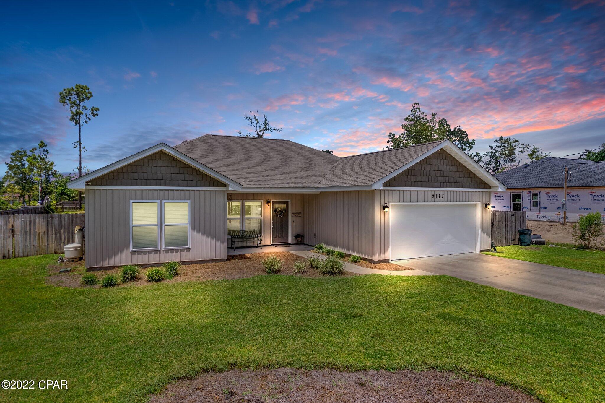 Take a look at this charming home with 3 bedrooms, 2 bathrooms  and an OFFICE/4th bedroom!  It features an open concept , split floorplan, and is located in a quiet area just on the outskirts of town.  This home sits on 1/2 an acre with a fenced in backyard.  Just a 15 minute drive to shopping and restaurants and 30 minutes to Tyndall AFB and PCB Beaches.

SHED DOES NOT CONVEY.