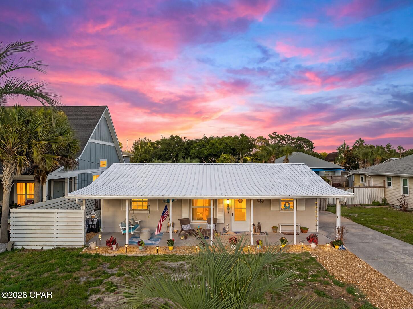 Welcome to your slice of paradise on the highly sought-after west end of Panama City Beach! Just one block from the sugar-white sands and emerald waters of the Gulf, this beautifully updated 3-bedroom, 2-bathroom home offers the perfect blend of coastal charm, modern upgrades, and the laid-back Florida lifestyle.

Step inside to discover a bright, inviting interior featuring fresh interior paint, updated hardware throughout, and an updated kitchen with beautiful quartz countertops, tiled backsplash and an oversized farmhouse-style sink The open, functional layout flows effortlessly into a spacious sunroom overlooking the backyard, creating the perfect space to relax with your morning coffee or unwind after a day at the beach.

The primary suite is a true retreat, featuring a stunning bathroom that has been completely remodeled from the ground up with stylish, high-end finishes and thoughtful design.

Outside, you'll immediately notice the home's fresh exterior paint, enhanced curb appeal, and beautifully refreshed landscaping with decorative rock accents. Your private tropical oasis features a sparkling in-ground pool, lush landscaping, generous outdoor living space, and a covered patio perfect for grilling, dining, or enjoying warm Florida evenings. Whether you're hosting pool parties or simply soaking up the sunshine, this incredible backyard is designed for making memories.

This home has also been thoughtfully updated with a brand-new HVAC system, providing comfort and peace of mind for years to come.

Whether you're searching for a full-time residence or a second home, look no further.  Located on the desirable west end of Panama City Beach and just 15 minutes from the renowned communities, restaurants, and beaches of 30A, you'll enjoy the best of both worlds--peaceful beach living with easy access to some of the Emerald Coast's most popular destinations.

With the Gulf just a short stroll away, thoughtful updates throughout, and an unbeatable outdoor living space, this is the Florida beach home you've been waiting for. Don't miss your opportunity to own a coastal retreat where every day feels like a vacation.
