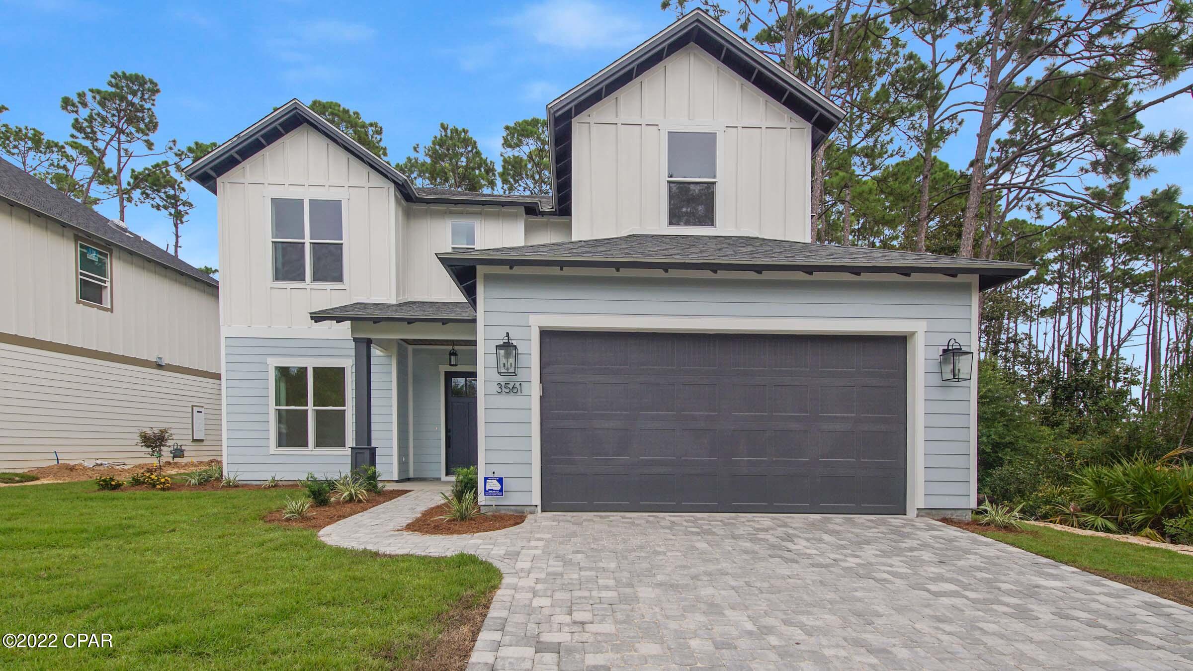 CURRENTLY UNDER CONTRACT, SELLER WILL CONSIDER BACKUP OFFERS .  Welcome to your DREAM HOME!  Sanctuary Beach is THE sought after gated subdivision near all the PCB marinas.  Enjoy the community pool or outdoor adventures, with a public trail just outside the subdivisions gate that allows you to launch your kayak or paddle board.  The Builder spared no expense in the construction and upgrades to this 4190 sq ft(3320 sq ft H/C), 4 bed 3.5 bath home with an office that can be used as a 5th room.  Upgrades include GORGEOUS Maple Flooring in the living areas.  In the Chefs Dream kitchen you will enjoy custom Maple cabinets with lighting over and under, a DREAM 48'' gas double oven and range w/ custom hood vent, a stainless steel PROFESSIONAL refrigerator, a your DREAM HOME, the Builder installed foam throughout the walls as well as the attic, keeping those energy costs low, as well as, a 16 sheer HVAC unit!!
For those who want and pay attention to details... This Home as details!!! YOUR FUTURE DREAM HOME features a paver driveway leading to the front porch that boasts a stained tongue and groove SOLID wood ceiling.  Upon entry you'll be amazed with the individual herringbone tile entryway.  10' ceilings downstairs(9' upstairs) and crown molding throughout.  Out back you will enjoy a back porch that backs to a natural preserve, and MORE tongue and groove ceilings.  The best part... upstairs you have a BONUS room that can be used as a game room or man cave for the ULTIMATE hangout spot or a quiet sitting room to enjoy a nice movie or just relax with your someone special.  This DREAM HOME has something for EVERYONE!! Call your favorite agent today to set up a private showing!!  DON'T LET THIS ONE PASS YOU BY