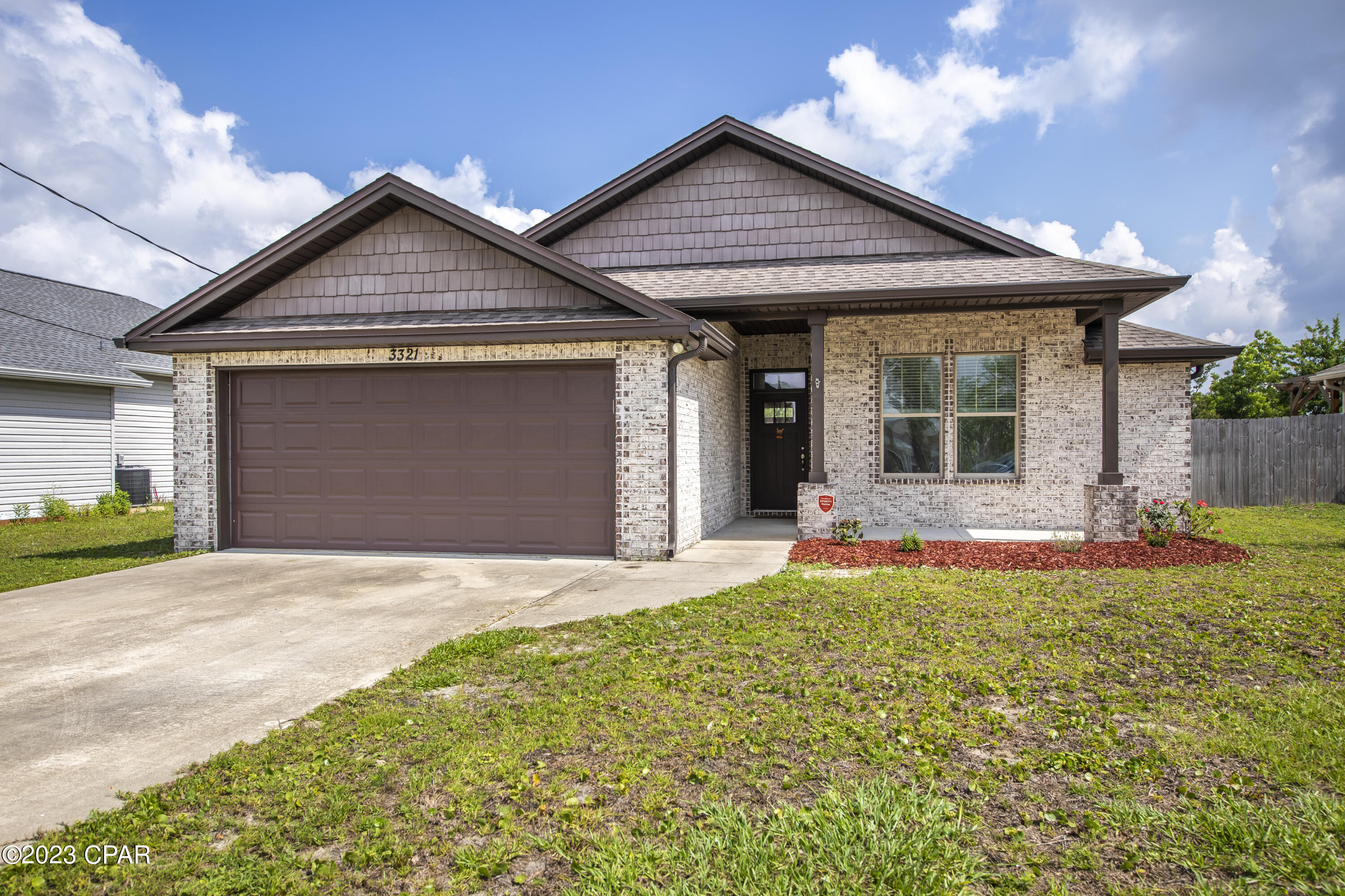 Check out this lovely craftsman style home built in 2018. This split 3 bedroom, 2 bath home offers an large open living area including the family room, dining room and kitchen.  The kitchen features custom painted cabinets with an island/breakfast bar that seats 2, stainless steel appliances including the fridge and a pantry adding more space for storage. The large master suite has a decorative step up ceiling and offers a large master bath that includes a separate shower and a soaking tub, double vanities, a walk-in closet and a private water closet. You can also enjoy cooking out and staying out of the sun by sitting under the large 16 X10 covered back porch in the afternoons, this home also has a nice size laundry room with cabinets and a 2 car garage with pull down stairs for attic storage. The lot is deep, 63X150, has a privacy fence in the backyard, also has sprinkler system. Lovely upgraded light fixtures/fans, plumbing fixtures and crown molding throughout the home! Carpet in bedrooms only with wood plank flooring throughout the living area and tile in laundry and bathrooms! Home is close to TAFB, shopping, restaurants and much more! Call for more information! To no fault of the sellers house is back on the market!! Call today to schedule a showing appointment!