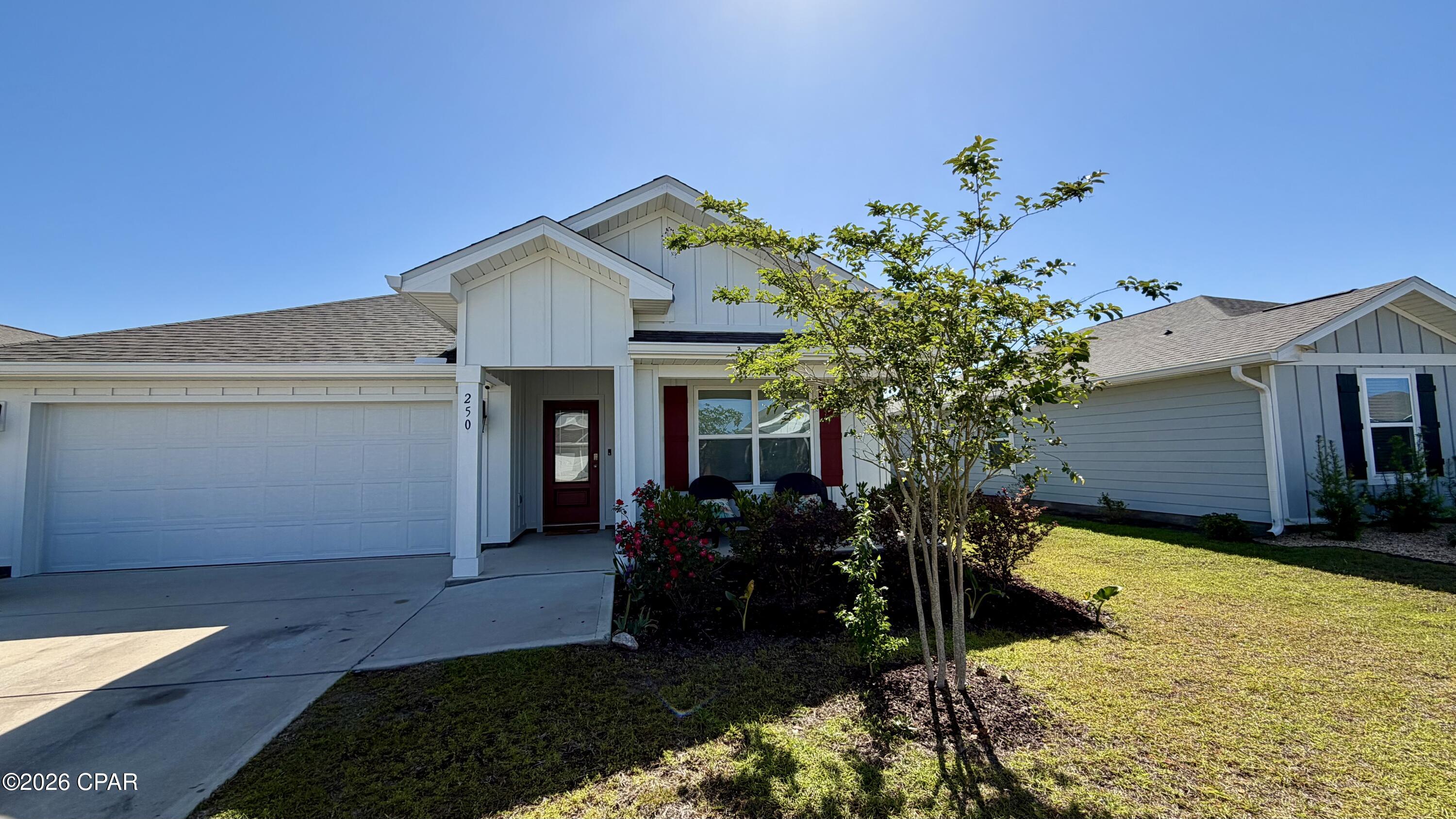 Discover this 4-bedroom, 2-bath home in Panama City's Park Place subdivision. The main living areas feature wood LVP flooring while the bedrooms are carpeted for added comfort. The primary bath offers a soaker tub, separate shower and a double sink vanity. A dedicated laundry room adds convenience. Community amenities include a playground and a public pool. This property combines practical design and neighborhood amenities for comfortable everyday living.