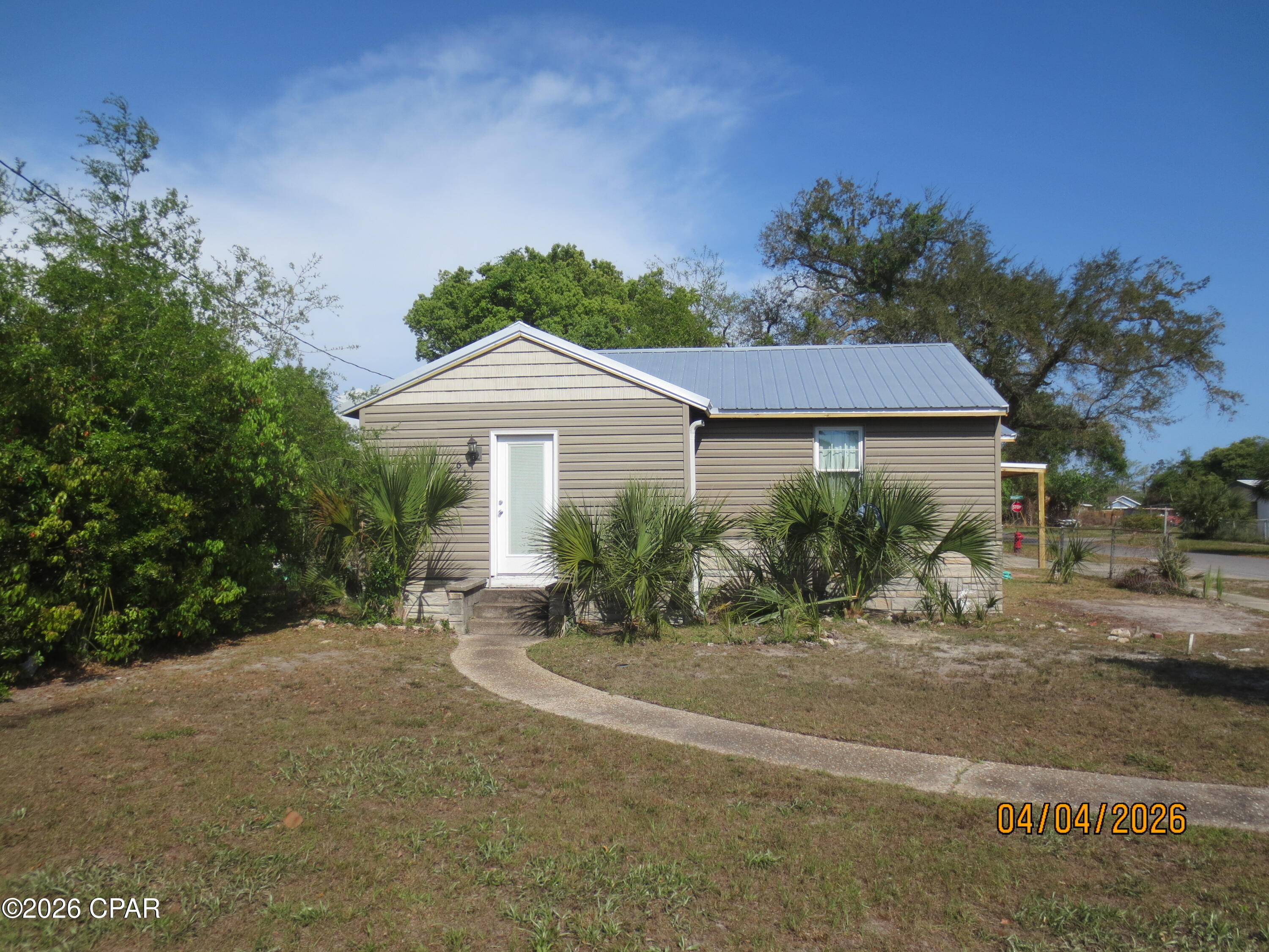 'CURRENTLY UNDER CONTRACT, SELLER WILL CONSIDER BACKUP OFFERS' 

Interior Fully Renovated Old Orchard Gem - Near Watson Bayou!

This nicely renovated 3-bedroom, 1-bath home offers 1,100 square feet of move-in-ready comfort in the desirable Old Orchard area. Completely gutted and brought back from the studs out after Hurricane Michael, the interior feels fresh and modern throughout. Enjoy peace of mind with a brand-new air conditioner installed in 2025, New Roof and New Carport just completed.

Inside, you'll find vinyl plank flooring throughout the main living areas with carpeted bedrooms for added comfort. The kitchen comes fully equipped with all appliances conveying, including a smooth-top stove, French door refrigerator, and washer and dryer.
 Located just one block off Watson Bayou, you're minutes from boating access that leads to the bay, Shell Island, and the Gulf--ideal for water lovers and outdoor enthusiasts.

This home is a fantastic opportunity for first-time buyers, investors, or anyone looking to enjoy affordable living close to the water. Brand New Roof, New Carport and Storage room on the side of the home has been redone. Everything is finished and just waiting on a new owner.