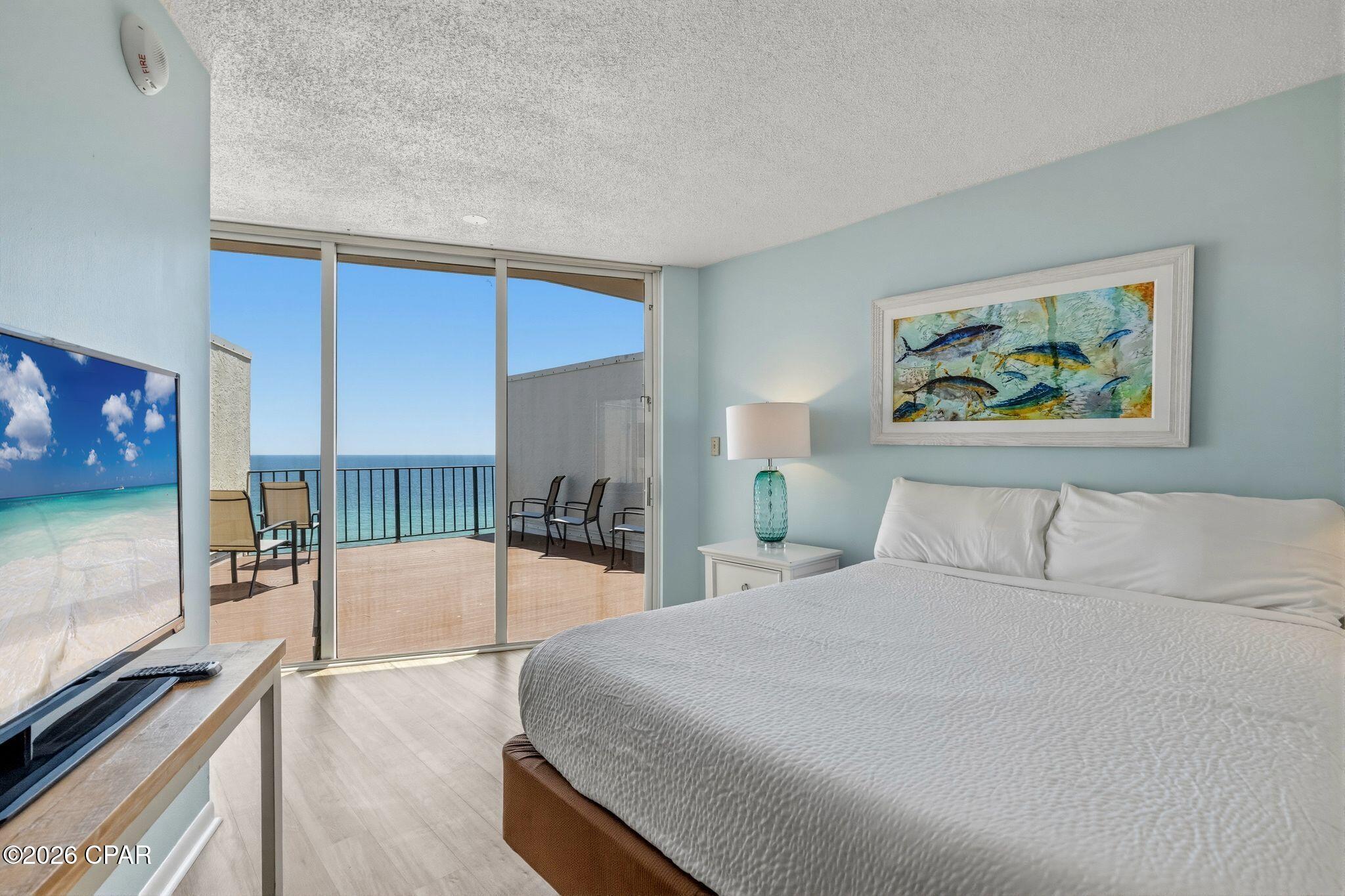 Enjoy spectacular Gulf-front views from this unique two-story condominium in the prestigious Tower I at Edgewater Beach & Golf Resort. Located on the 12th floor, this 3-bedroom, 3-bath residence features an interior staircase and private balconies on both the 12th and 13th floors, offering panoramic views of the Gulf of America, Sugar-White Beach Sand, Edgewater's main Lagoon Pool Deck, and resort grounds.
One of the resort's most desirable floor plans, the main level includes two bedrooms, two bathrooms, an open living area, and a beachfront balcony. Upstairs, a private third bedroom suite with a full bath opens to a large penthouse-style balcony.
Floor-to-ceiling windows fill the unit with natural light and showcase stunning Gulf views. Whether you're seeking a primary residence, vacation home, or investment property, Unit 1208 offers an exceptional opportunity to own in Panama City Beach's premier full-service resort.
Edgewater owners and guests enjoy outstanding amenities, including the 11,500-square-foot Lagoon Pool, 13 additional pools, private beach access, tennis and pickleball courts, a 9-hole golf course, fitness center, spa, on-site dining, market, Starbucks, and 24-hour gated security.
Edgewater Tower 1-1208 is currently enrolled in the Southern Vacation Rentals program and has a strong rental history. Buyer must honor all confirmed reservations. 

*See Documents for Southern Vacation Rental History and Future bookings. E1-1208 generated over $40K in 2025 (with 44 Owner Nights). For 2026, it already has over $44K base rental income on the books (with 28 Owner Nights), and plenty of availability left for additional bookings to fill in as we roll through Q3 & Q4 2026; on pace for likely $50K+ total 2026 rental income.

*Downstairs is 1055 sqft like all units in the '08 stack directly below, but this penthouse unit also has approx 200+ additional interior sqft upstairs with 3rd bedroom and 3rd bathroom. Buyer to verify all measurements. Thanks!