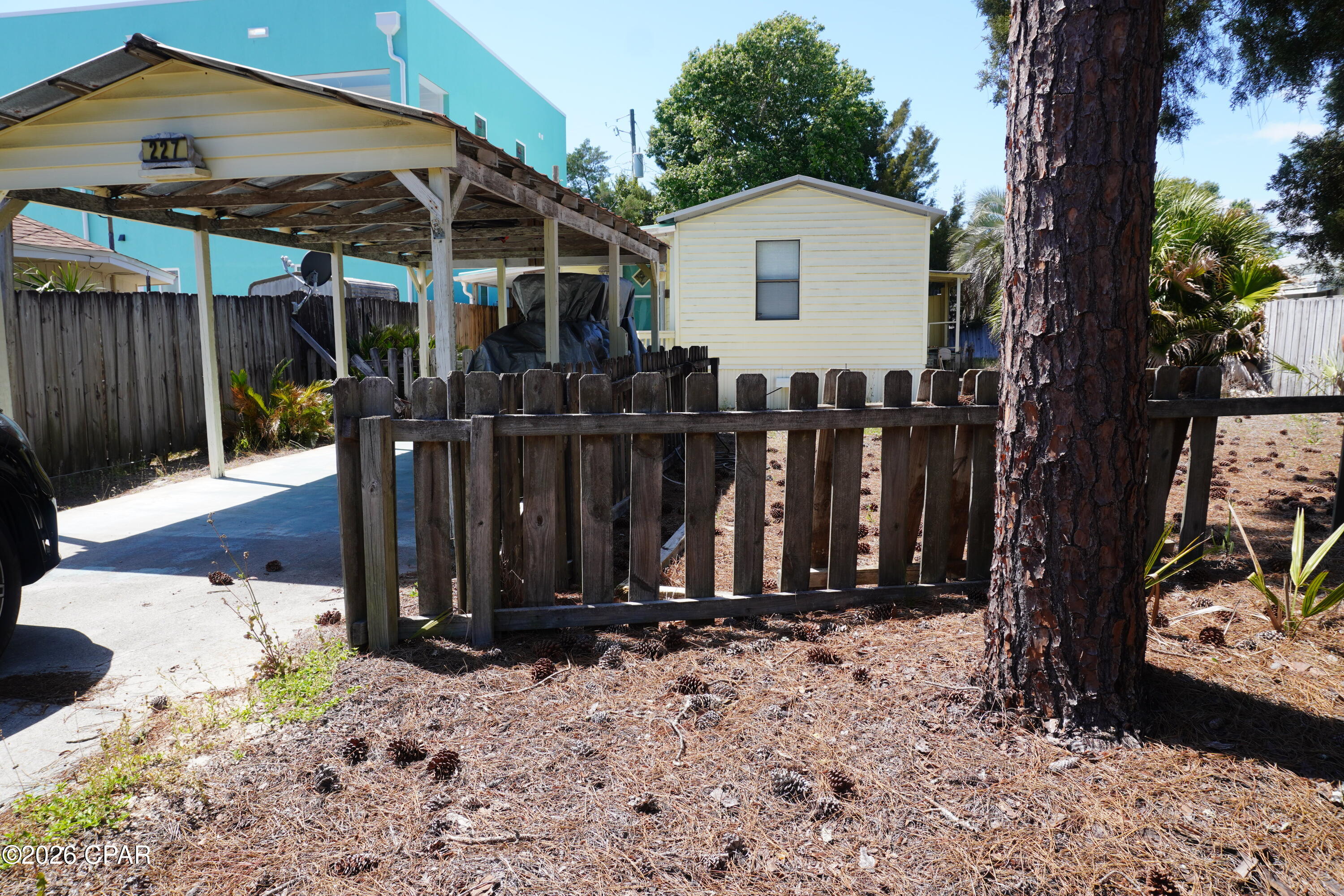 Fantastic location approximately 1/2 mile from the beach with public access. 57x103 lot(need survey) with strong potential. Existing mobile home (no wheels/axles) conveys as-is. The majority of the value is in the land but the mobile home is great for a weekend getaway. 
It is the responsibility of the buyer to verify all measurements if you so desire.