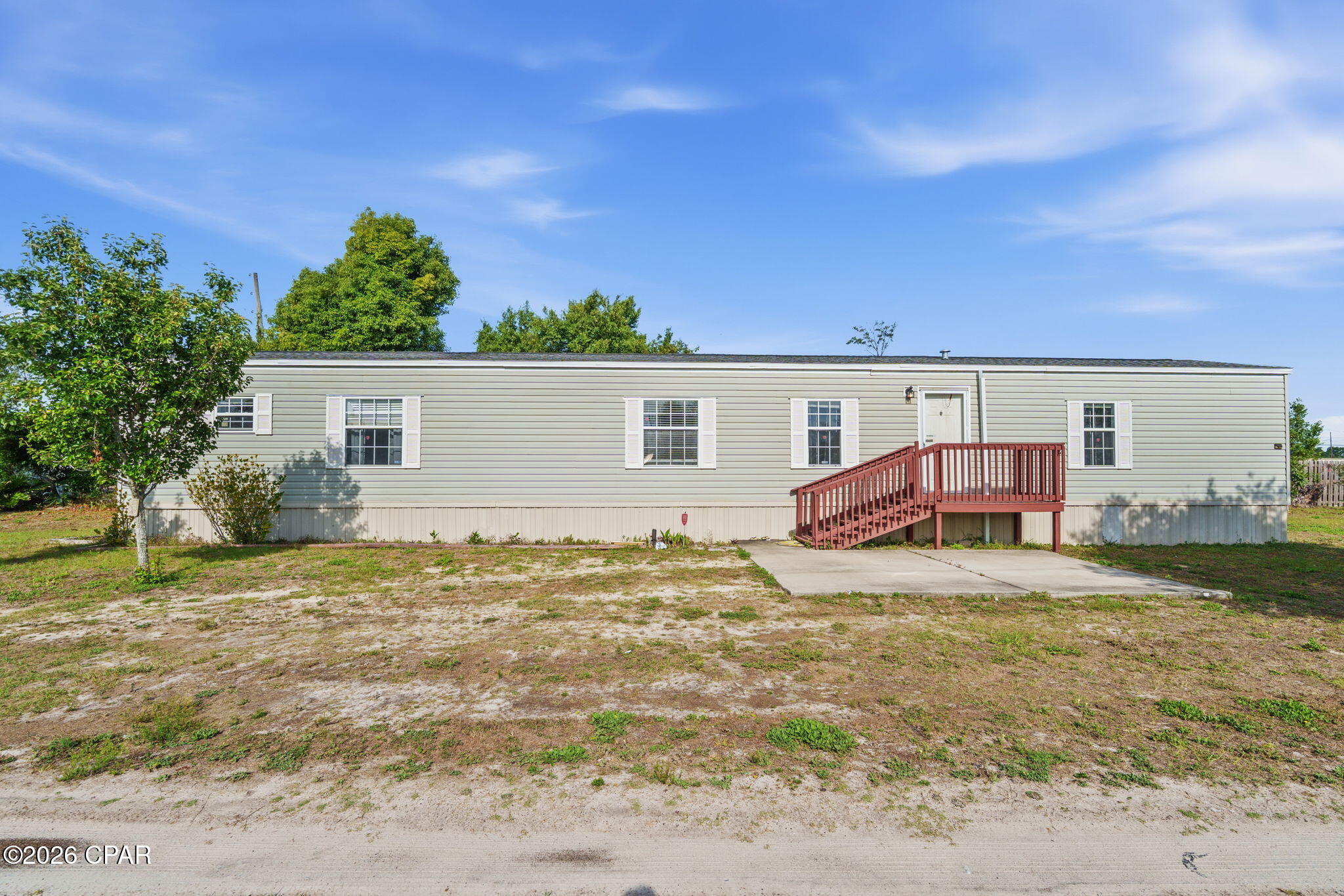 'CURRENTLY UNDER CONTRACT, SELLER WILL CONSIDER BACKUP OFFERS' 
3515 E 14th St, located in unincorporated Bay County, offers affordable living with a surprising amount of outdoor space in a convenient central Panama City location. Located just off of 15th Street, this property provides quick access to shopping, dining, schools, Tyndall Air Force Base, and everyday conveniences while still offering a residential setting.

This well-maintained 2013 mobile home features 3 bedrooms, 2 bathrooms, and approximately 1,140 heated square feet with a split-bedroom floor plan and open living area. The kitchen offers plenty of cabinet space, an island for additional prep and storage, and an eat-in dining area that flows easily into the main living space. The home has been cared for over the years and also features a newer roof installed in 2020.

Outside is where this property really stands out for the price point. The spacious 0.33-acre lot has been nicely maintained with mature trees, garden areas, open green space, and room to enjoy the outdoors. There is also a storage shed (approx 7' x 9.5') that provides additional space for tools, lawn equipment, or hobbies, and even a manual well pump! The yard offers flexibility for pets, gardening, entertaining, or simply having extra elbow room that can be hard to find at this price.

Whether you're looking for a primary residence, an investment property, or an affordable home with outdoor space and no HOA, this property is worth a look. Buyer to verify measurements and any information deemed important.