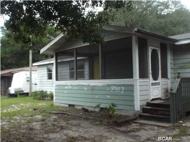 Three bedroom one bathroom home on a one third acre lot offered as is. The property features a large living room, inside washer and dryer hook up and is just off of 23 Street in Saint Andrews. The exterior has a screened large front porch and the back yard has a storage shed and is fenced. All sizes approximate or taken from other sources please verify accordingly.