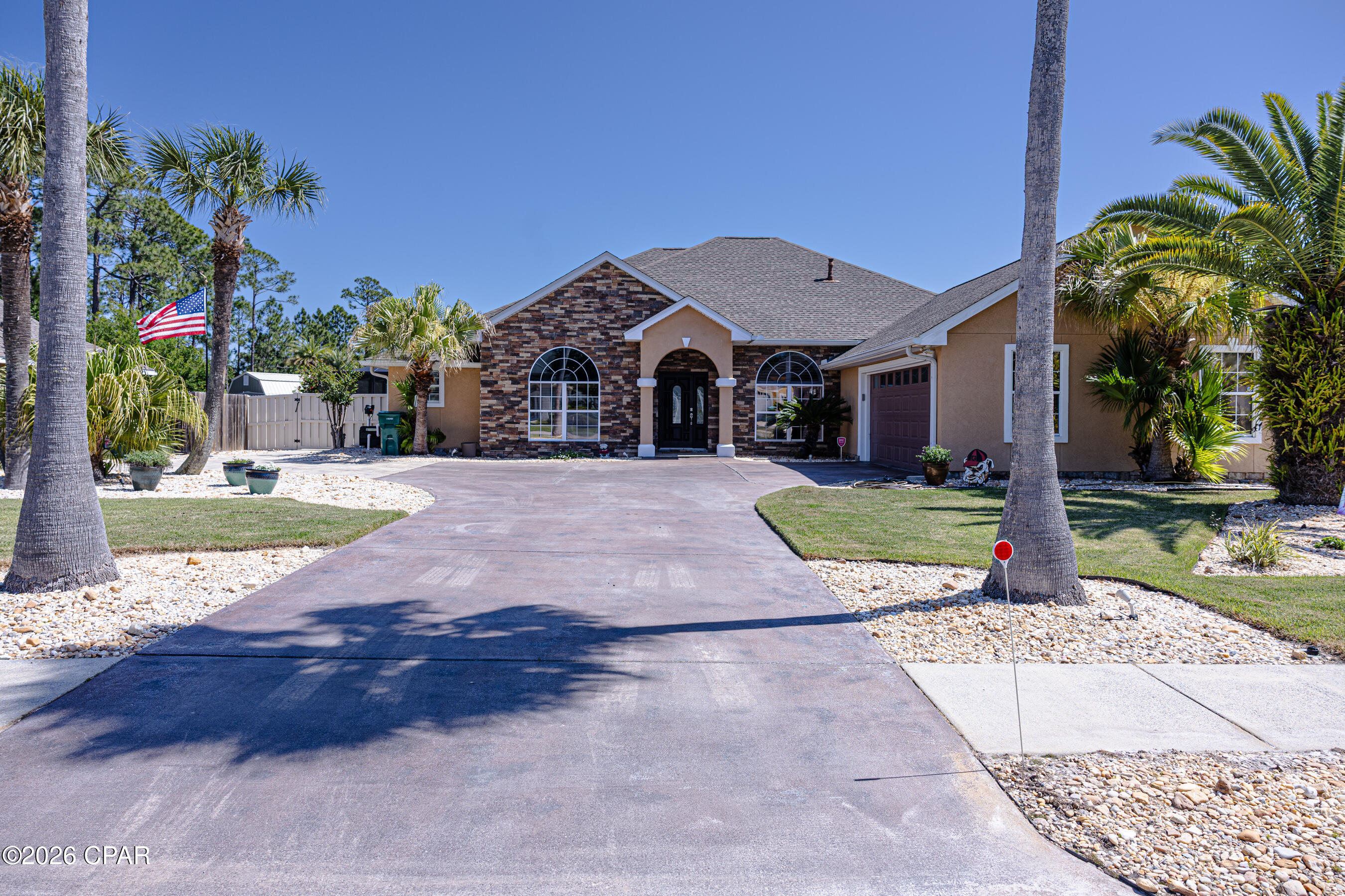 Motivated to Sell.  Beautifully maintained home with screened-in natural gas heated pool & spa, outdoor kitchen, and additional flex room--great for enjoying Florida living year-round! The property features an inviting open layout with tile/LVP flooring, and a spacious living area anchored by a custom stone fireplace.

The updated kitchen features modern cabinetry and ample space for cooking and entertaining. The primary suite is a true retreat with a spa-like bathroom with a walk-in glass shower, soaking tub, and an oversized custom closet.

Additional highlights include a dedicated home office (or 4th bedroom) with arched window, generously sized secondary bedrooms, and a functional laundry room.

Home also includes a Generac whole-house generator, tankless hot water heater and a Culligan water softener/filtration system.