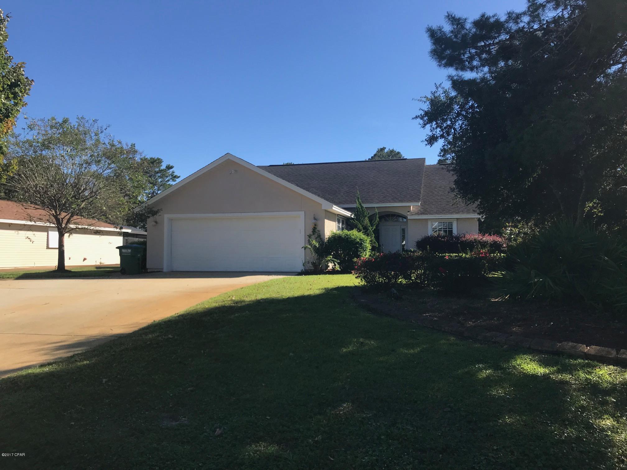 Incredible find on the West end of Panama City Beach.  This is a very well kept 3 bedroom 2 bath home located on the West End in between Back Beach and Front Beach Rd - just a short distance to the beach.  This home features laminate hard would in the living room and master bedroom, vaulted ceiling in the living room and kitchen, breakfast bar, covered patio, fenced back yard and 2 car garage.