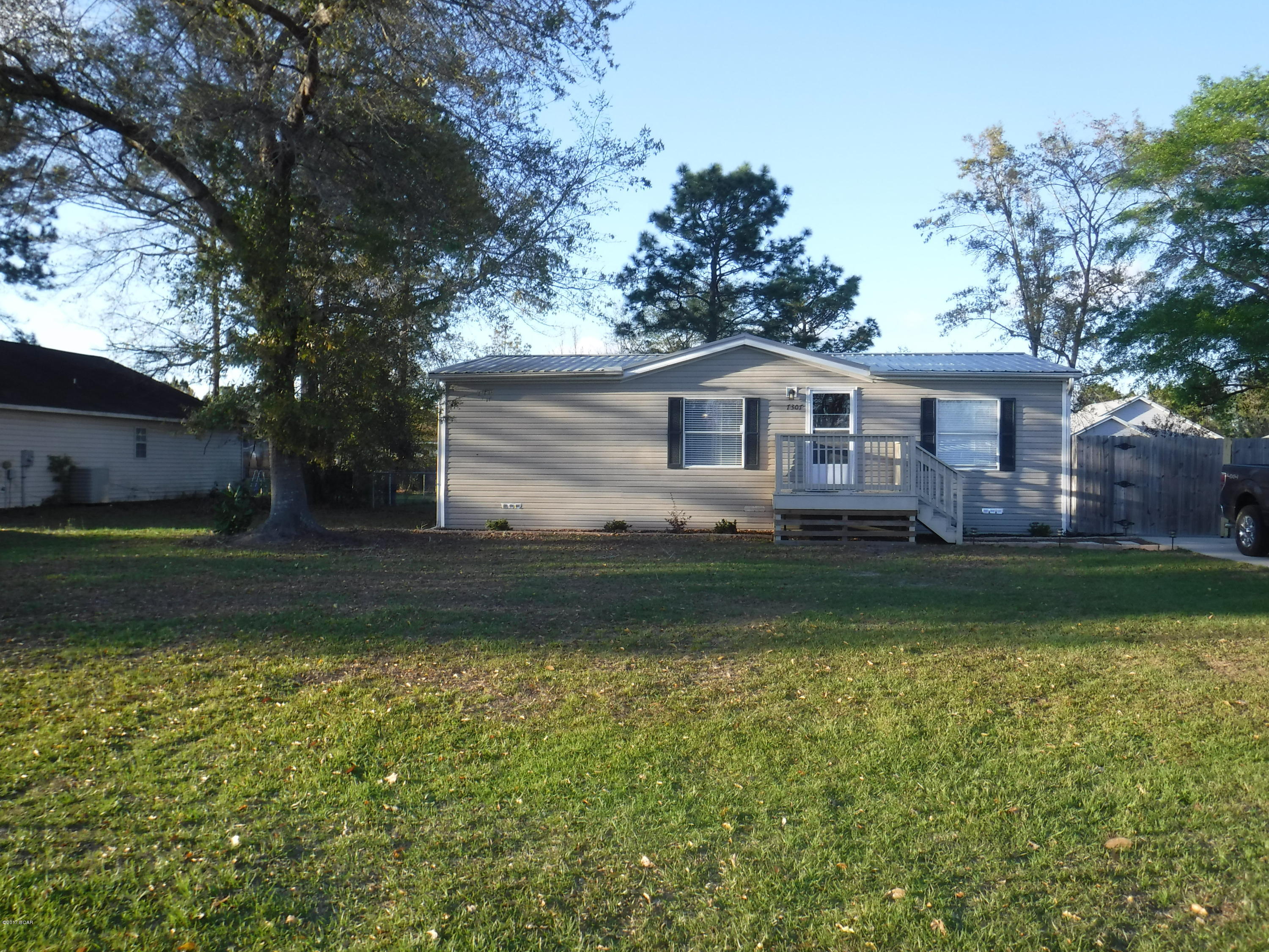 Nice 2 bedroom, 2 bath manufactured home located in Sweetwater Village with laminate wood floors and ceramic tile. Kitchen is loaded with cabinet space, breakfast bar and new refrigerator. All property sizes and ages are approximate, please measure and/or verify if important. School assignments are subject to change, please check with Bay County for most accurate information. Deposit is the same as the rent. Pets allowed with owner approval and NON REFUNDABLE pet fee applies per pet. Breed restrictions apply with 2 pet limit.
