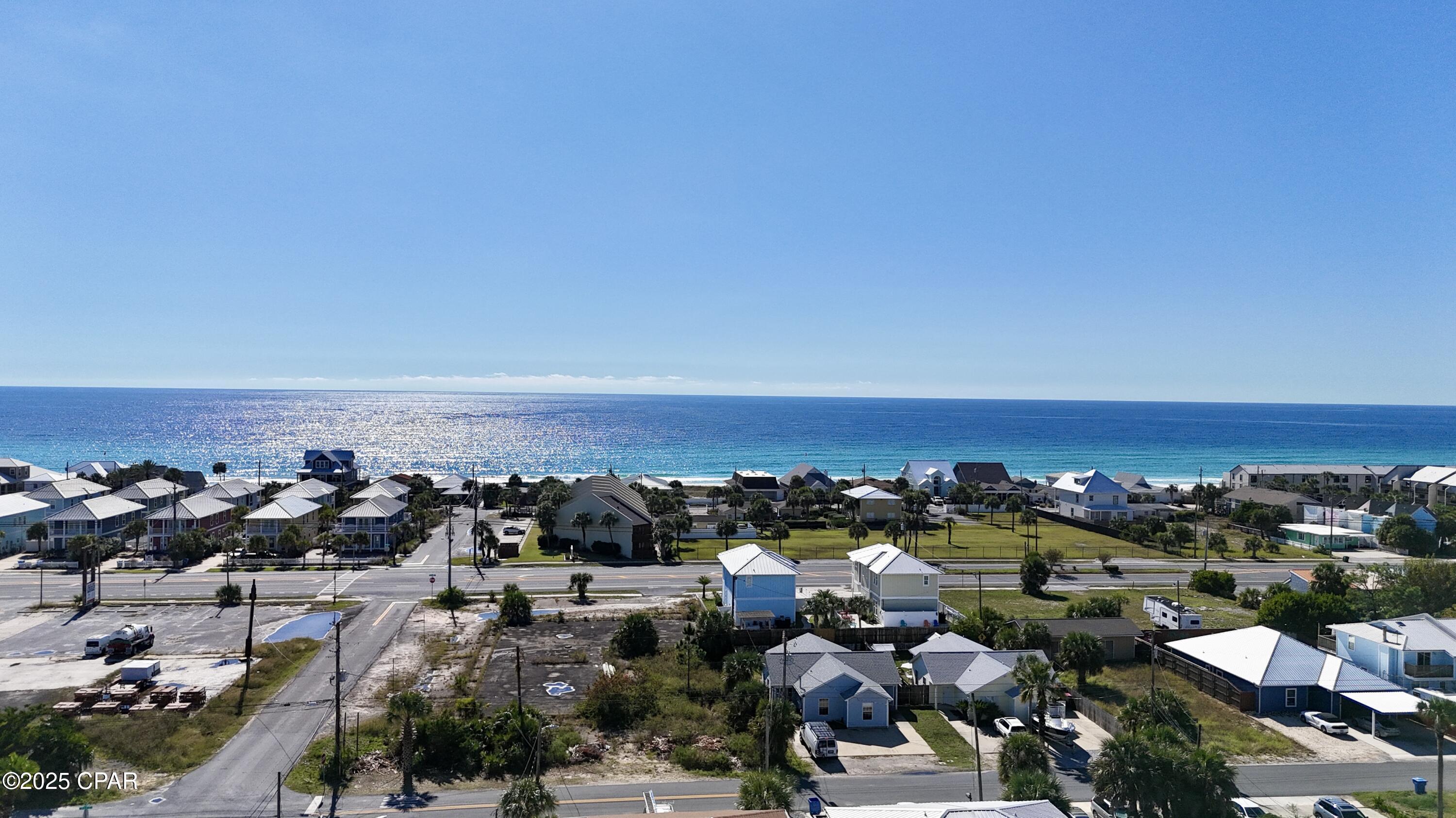 This is your chance to secure a rare development opportunity along the highly sought-after Thomas Drive business corridor.
An exceptional .51-acre site (three combined lots: 100' x 220') with frontage on Thomas Drive, Beach Drive, and Biltmore Drive. This unique configuration provides access from three road fronts, offering excellent visibility and accessibility for future development.
•	Zoned C-1 (Neighborhood Commercial) - allows for a wide range of commercial, mixed-use, and multifamily opportunities
•	Density: Up to 15 units per acre
•	Not in a flood zone, yet just 500 feet from the Gulf of Mexico
•	Gulf views possible from a multi-story structure
•	Surrounded by new homes, high-rise condos, restaurants, close to public beach access (#9), and major attractions
•	Ideal for commercial retail, short-term rentals, townhomes, or a mixed-use development
A three-story building on this site would capture breathtaking Gulf views, making it perfect for a boutique hotel, retail center, or luxury residential units.

Buyer should verify all details related to this property.

Property includes 3 parcels- 32362-000-000; 31857-000-000; 31856-000-000