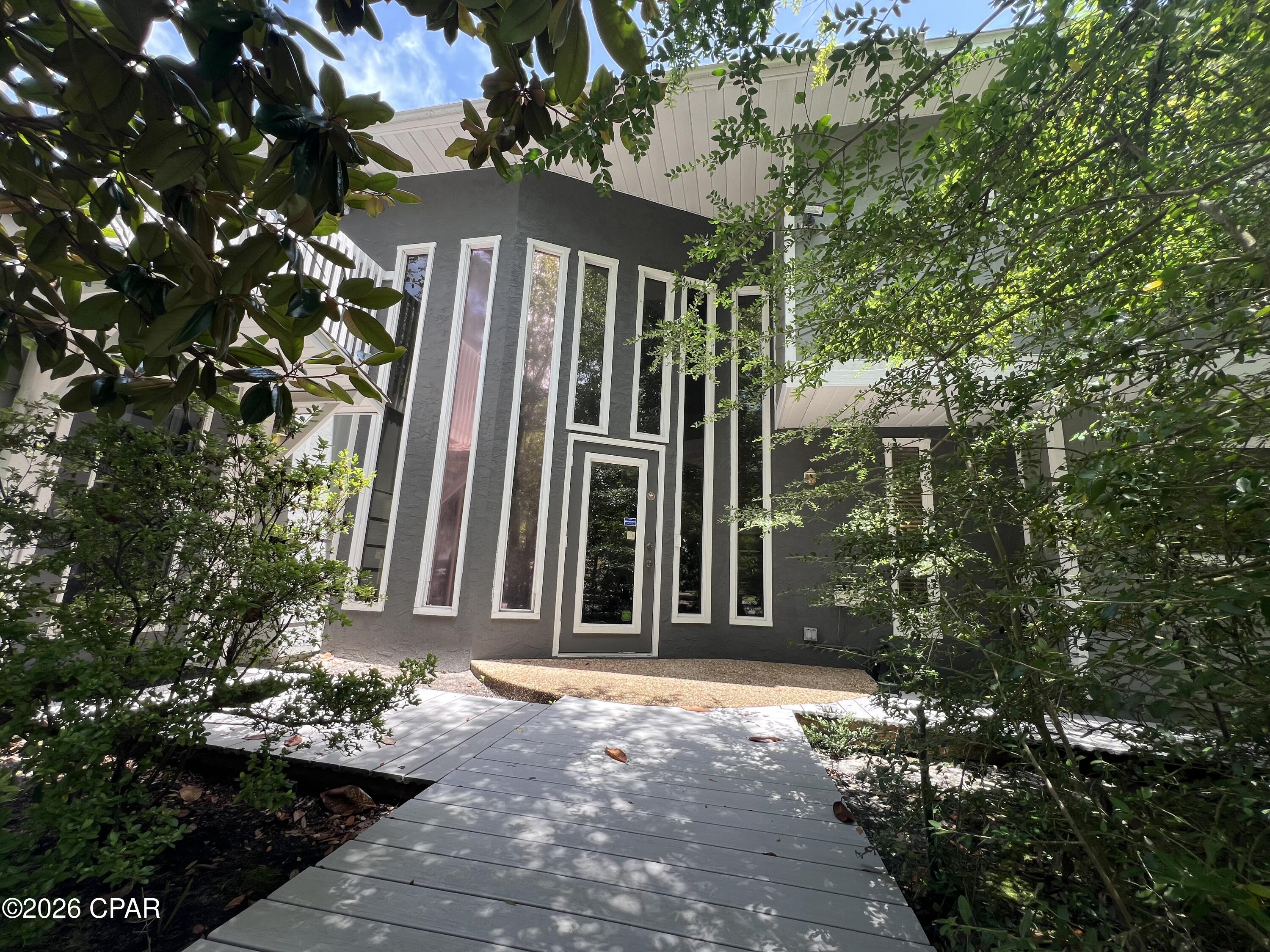 The Cornerstone Office Building features six individually leased office spaces. It is perfect for startup businesses, expanding enterprises, creative groups, individual professionals, and others with small office needs. The exterior is a beautifully landscaped park-like setting, perfect for those who reach their perfect work flow state by sitting outside under blossoming magnolias. The landlord covers power, water, internet, landscaping, and common area janitorial, for easy book keeping. Tenants have access to all common areas, including the lobby, conference room, restrooms, and break room/ kitchenette, which passes through to all tenants for an additional $300/ suite/ month. Electronically controlled 24 hour access is available for night owls and weekend warriors. Centrally located between downtown and St Andrews on the corner of 11th and Fortune, this building is exceptionally accessible and convenient!