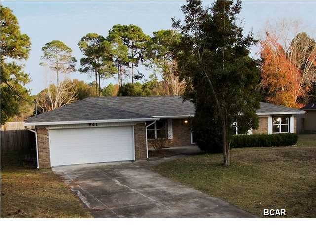 COMPLETELY REMODELED and Looks amazing!! By far the best looking home for this price in the area. This 3/2 with an office is all brick home and sits on a half acre. Located in the well established neighborhood of Plantation Estates. You will absolutely fall in love with this home the second you walk through the front door. Upgraded tile throughout, New roof, New cabinets, New counter-tops, New lighting, New paint, plus SO much more. This home is move in ready and all your major expenses are new so you don't have to worry about coming out of pocket for repairs. The open floor plan is perfect for a growing family or someone looking to entertain friends. The bonus/family room also has a fireplace and French doors leading out to the screened in patio. The backyard has just the right amount