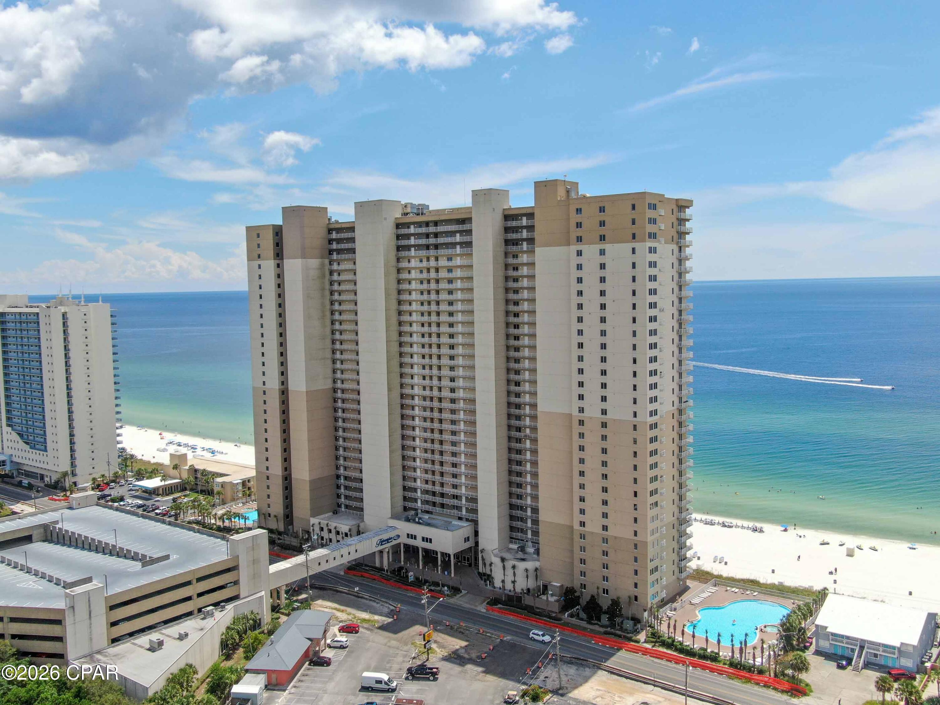 Spacious Condo for sale in Panama City Beach, FL.  Enjoy the sugar-white sands of Panama City Beach right in front of you!!  This floorplan features a spacious 2-bedroom condo with a dedicated bunk room and 3 full bathrooms offering you the ideal blend of comfort, and investment potential.  The Perfect location on the West end of PCB, a half mile to Pier Park for endless shopping, tons of restaurants, a full Movie theatre, entertainment and much more! Tidewater Beach offers tons of amenities - Two 4,200 sq. ft. lagoon pools with poolside tiki bars, and a separate indoor heated pool.  A 4,300 sq. ft. fitness center with oversize indoor spa & hot tub,  Steam baths and saunas in both men & women's baths at the fitness center, and a
5,000 sq. ft. conference center.  Owners enjoy a Penthouse, top floor owner's lounge.  
Seven high-speed elevators, mean no long elevator lines. A Theater with stadium seating, entertainment and much more!   Feel secure with the gated parking garage with an enclosed walk over bridge.  This is the Condo you have been looking for!