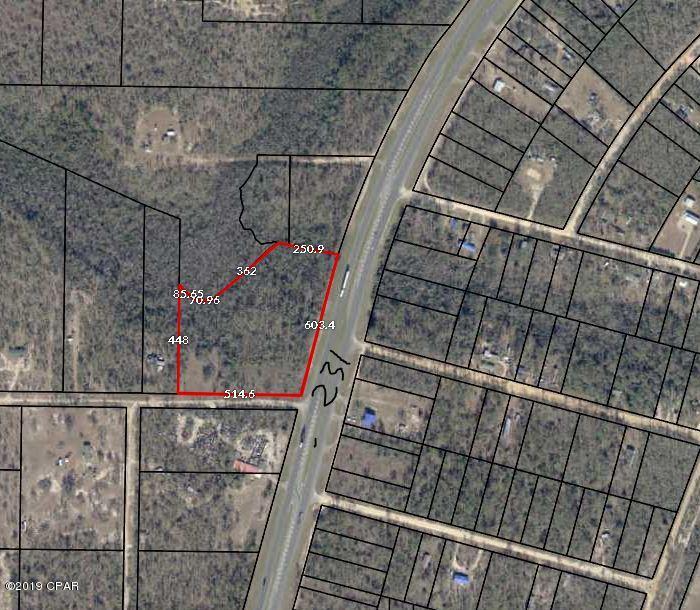 Perfect large piece of land currently zoned residential great for a large homestead. This piece could be zoned commercial right off Highway 231 great for a business with high traffic volume.